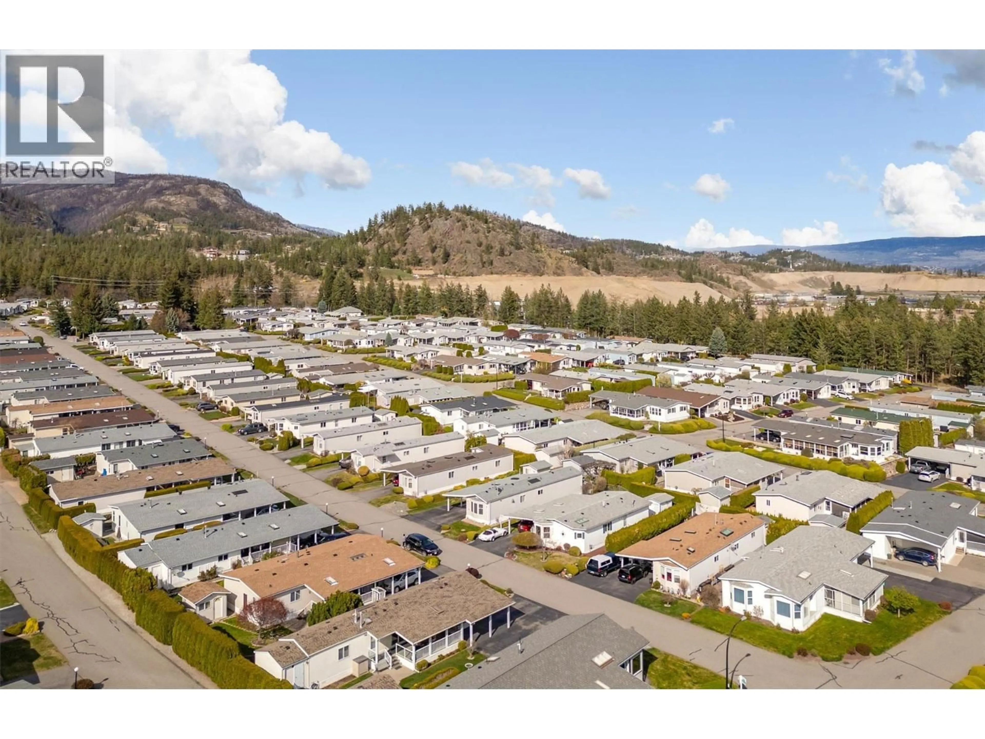 A pic from outside/outdoor area/front of a property/back of a property/a pic from drone, mountain view for 169 - 1850 SHANNON LAKE ROAD, West Kelowna British Columbia V4T1L6