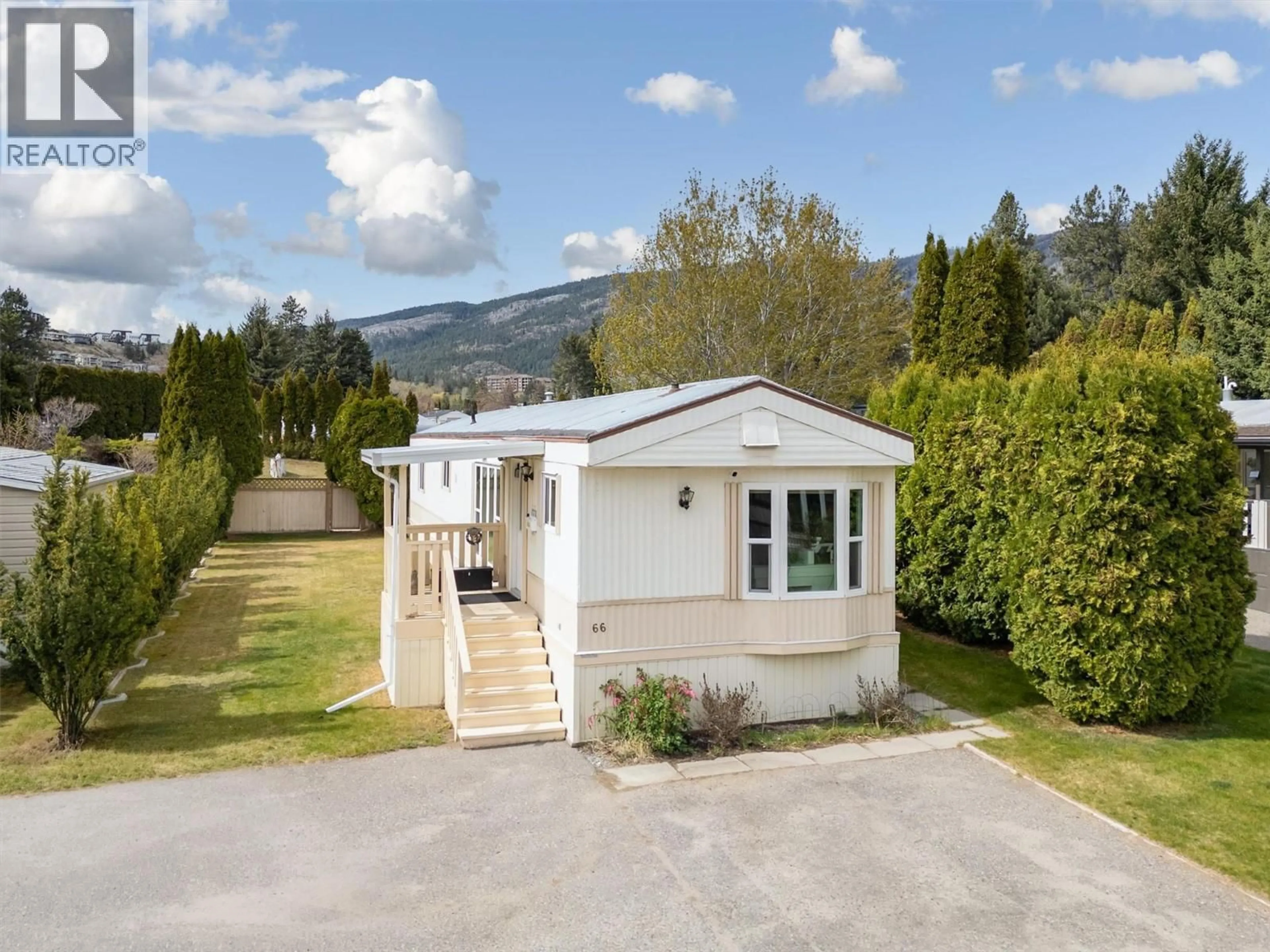 A pic from outside/outdoor area/front of a property/back of a property/a pic from drone, mountain view for 66 - 1929 97 HIGHWAY SOUTH, West Kelowna British Columbia V1Z2Z1