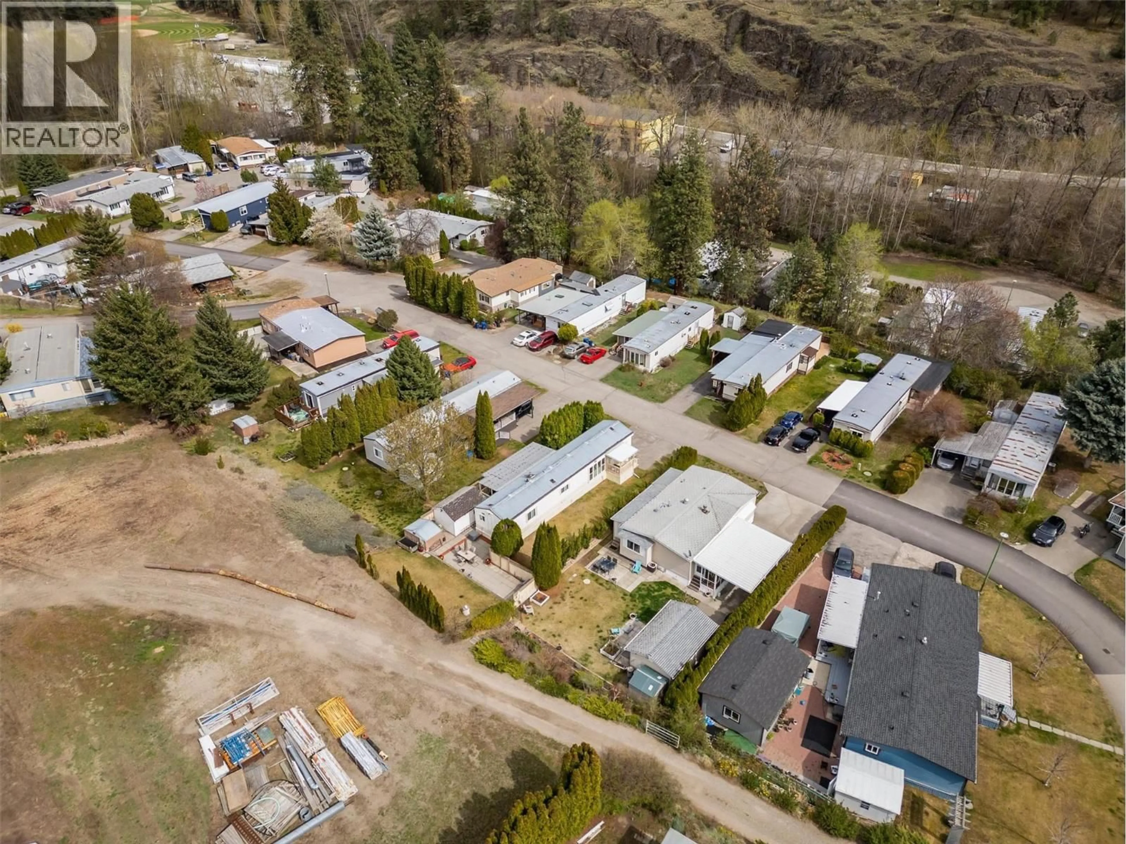 A pic from outside/outdoor area/front of a property/back of a property/a pic from drone, street for 66 - 1929 97 HIGHWAY SOUTH, West Kelowna British Columbia V1Z2Z1