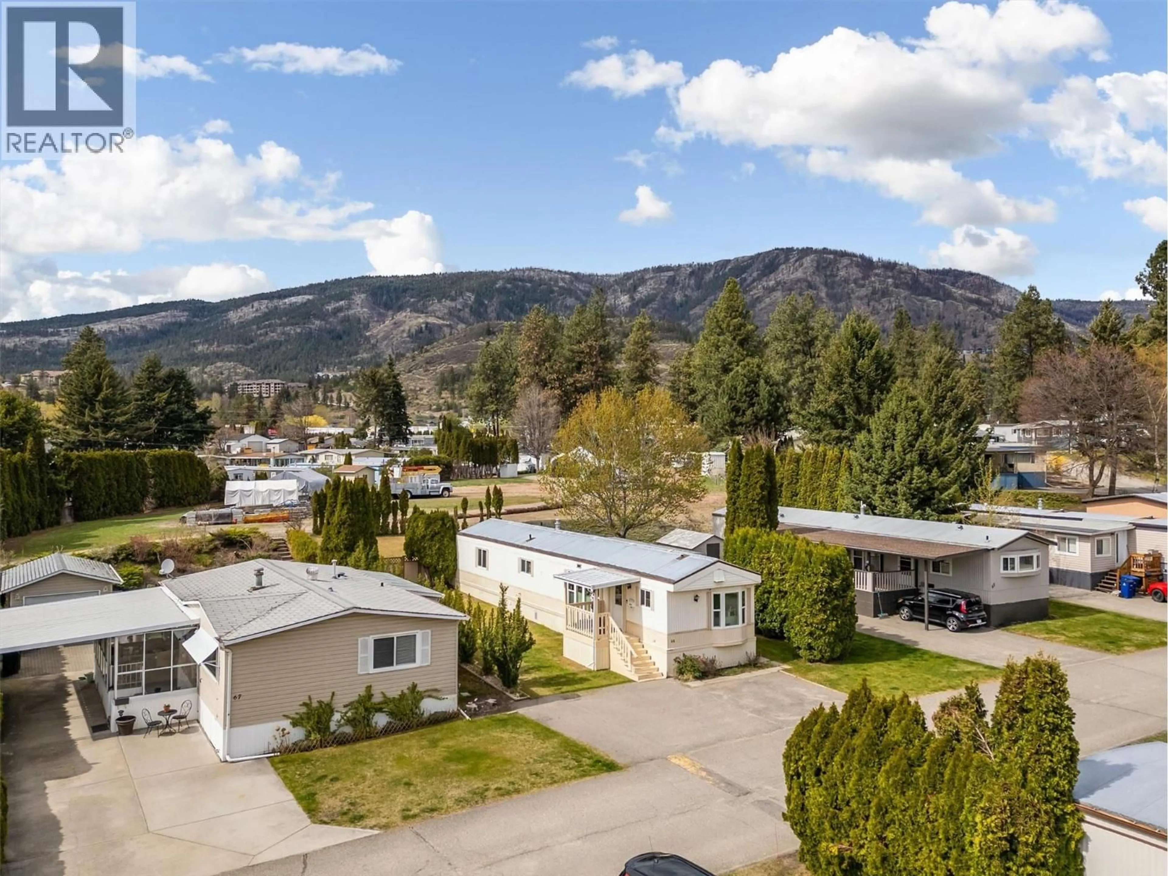 A pic from outside/outdoor area/front of a property/back of a property/a pic from drone, mountain view for 66 - 1929 97 HIGHWAY SOUTH, West Kelowna British Columbia V1Z2Z1