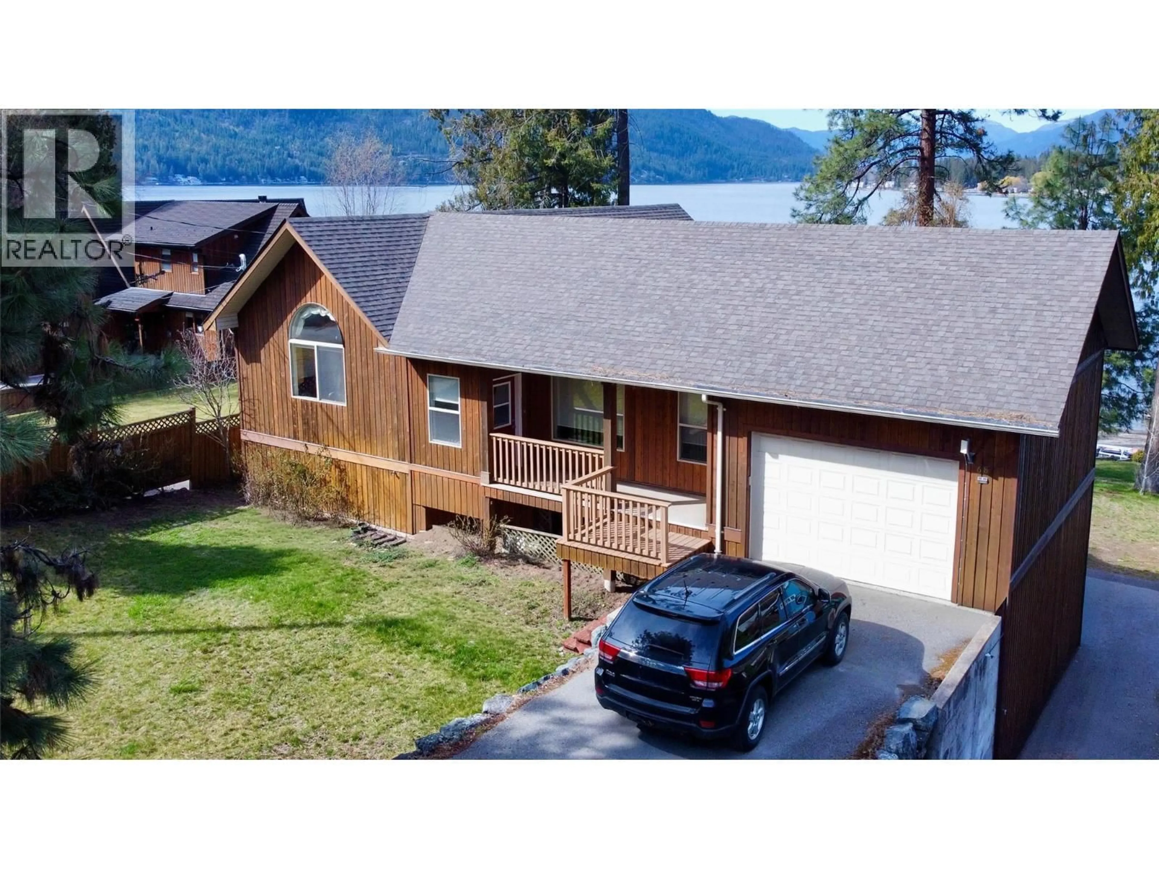 A pic from outside/outdoor area/front of a property/back of a property/a pic from drone, water/lake/river/ocean view for 70 SANDNER ROAD, Christina Lake British Columbia V0H1E0