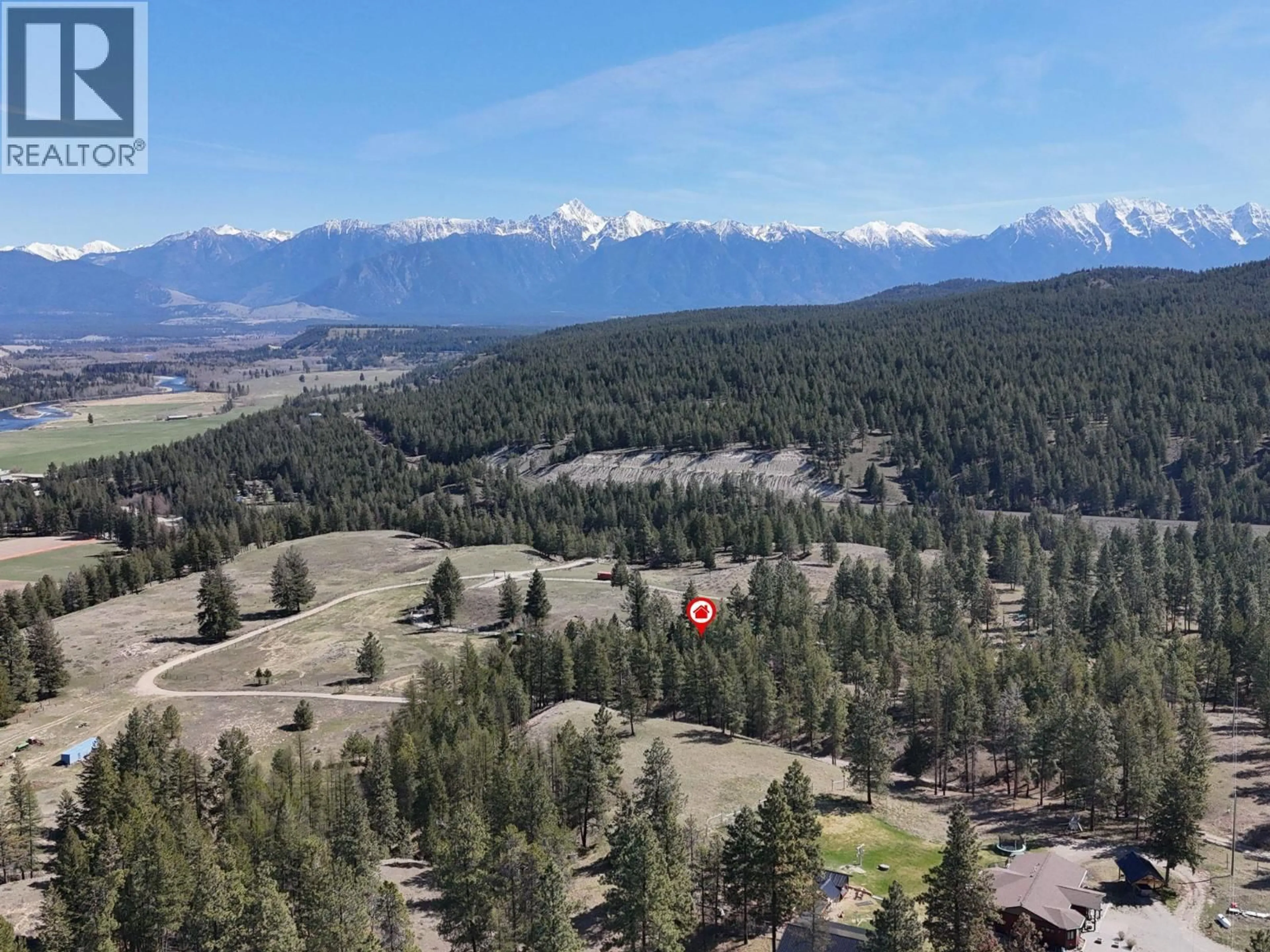 A pic from outside/outdoor area/front of a property/back of a property/a pic from drone, mountain view for 6209 MISSION ROAD, Cranbrook British Columbia V1C7B7