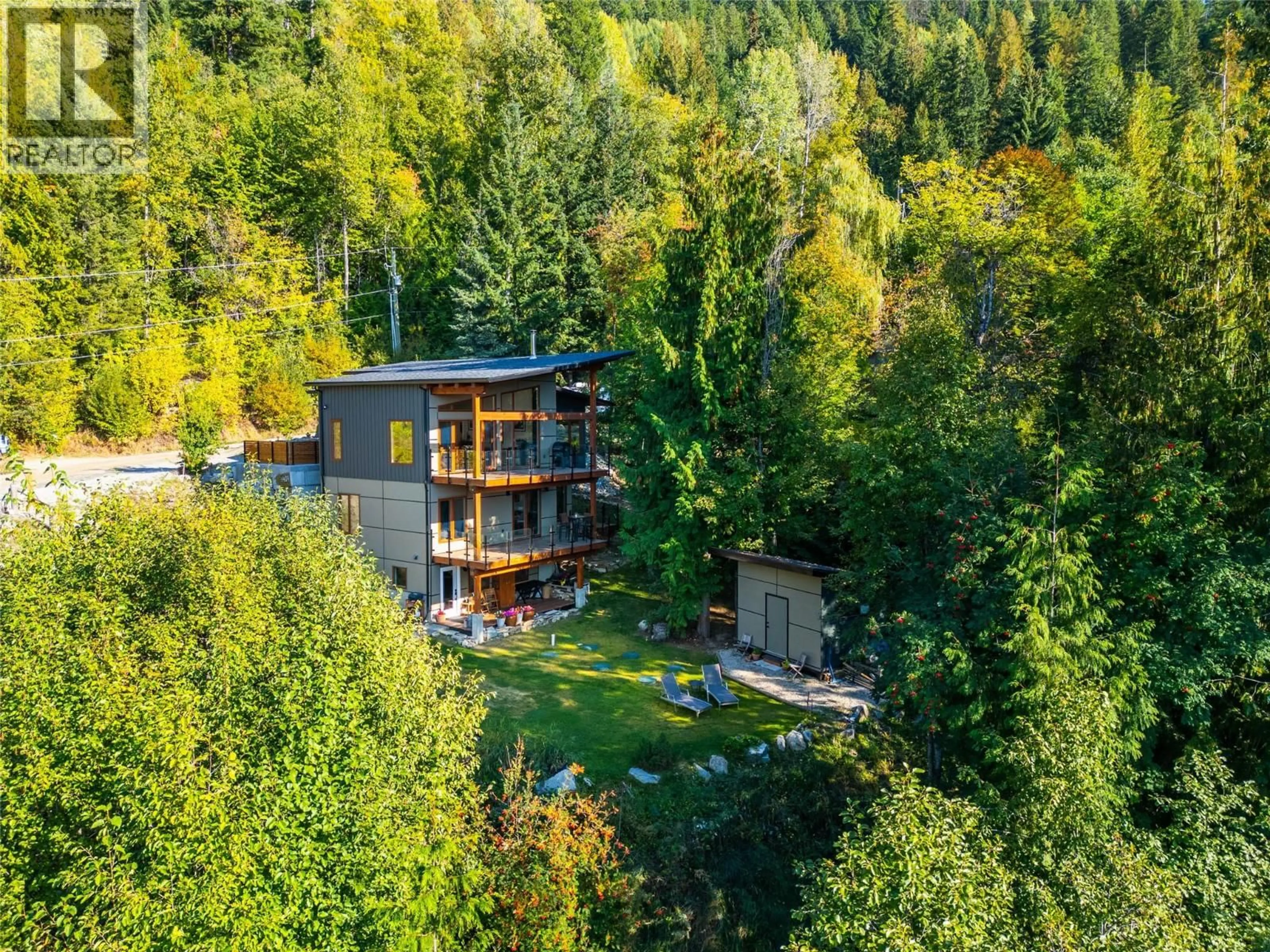 A pic from outside/outdoor area/front of a property/back of a property/a pic from drone, forest/trees view for 1409 ASH STREET, Nelson British Columbia V1L2J3