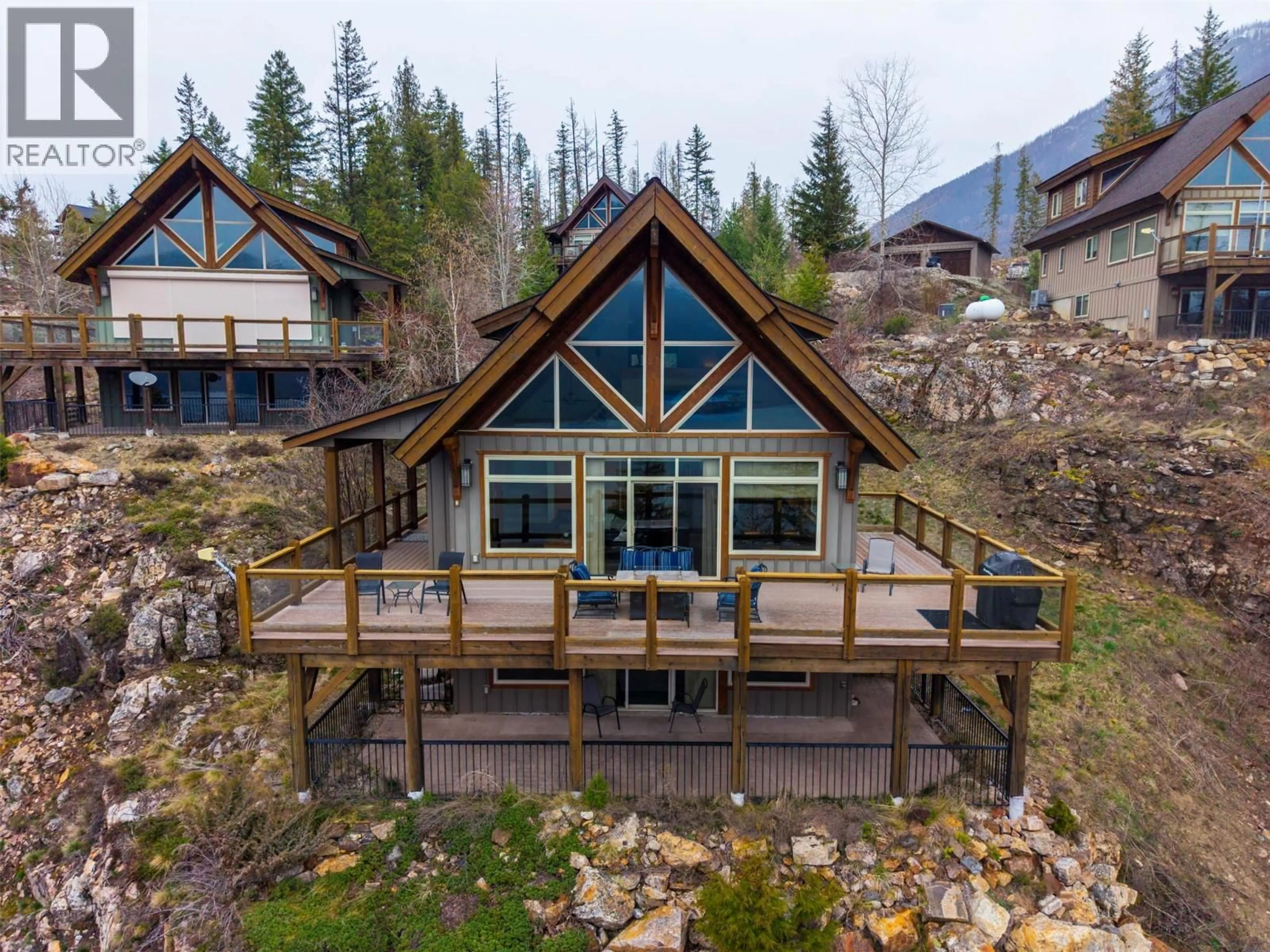 A pic from outside/outdoor area/front of a property/back of a property/a pic from drone, water/lake/river/ocean view for 3 - 9191 VALHALLA VIEW DRIVE, Nelson British Columbia V0G2B0