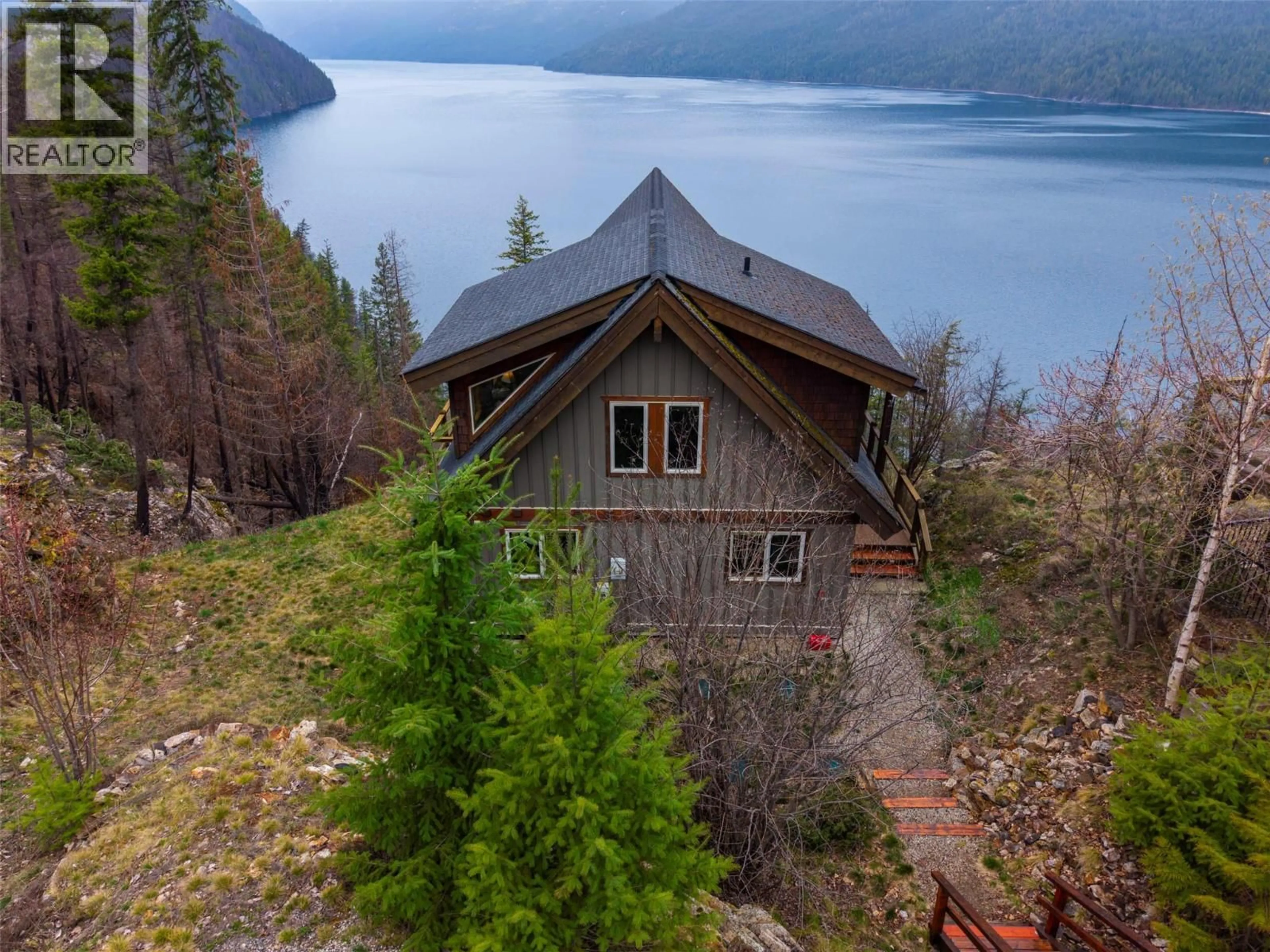 A pic from outside/outdoor area/front of a property/back of a property/a pic from drone, water/lake/river/ocean view for 3 - 9191 VALHALLA VIEW DRIVE, Nelson British Columbia V0G2B0