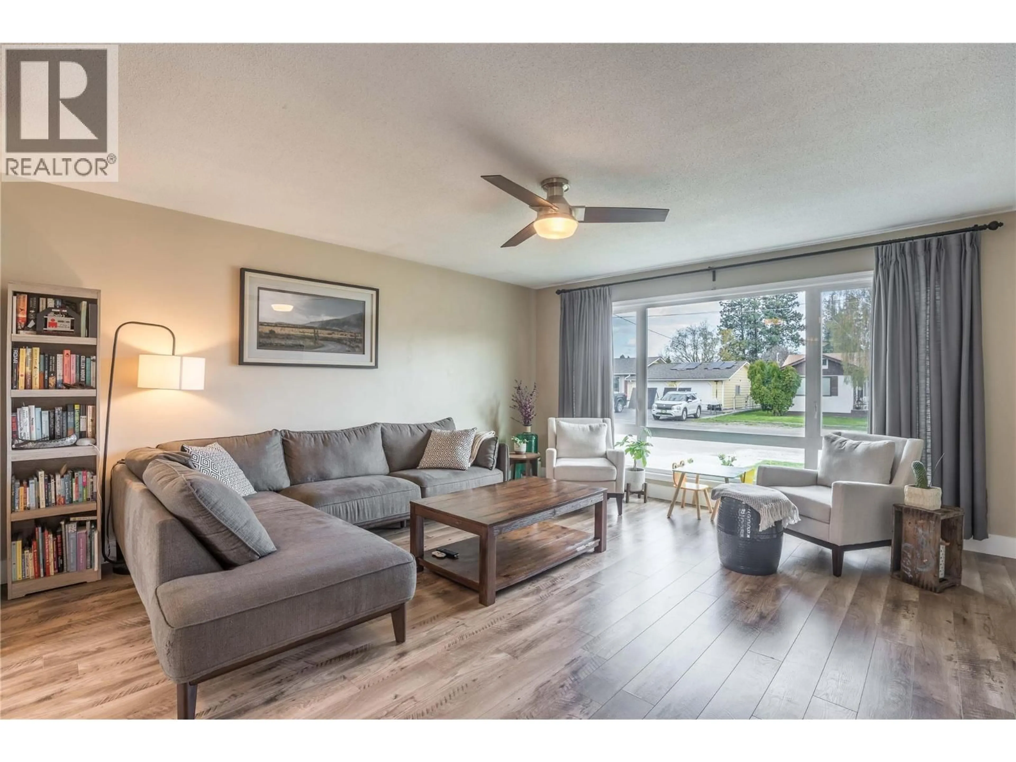Living room with furniture, wood/laminate floor for 2513 JUNIPER STREET, Summerland British Columbia V0H1Z4