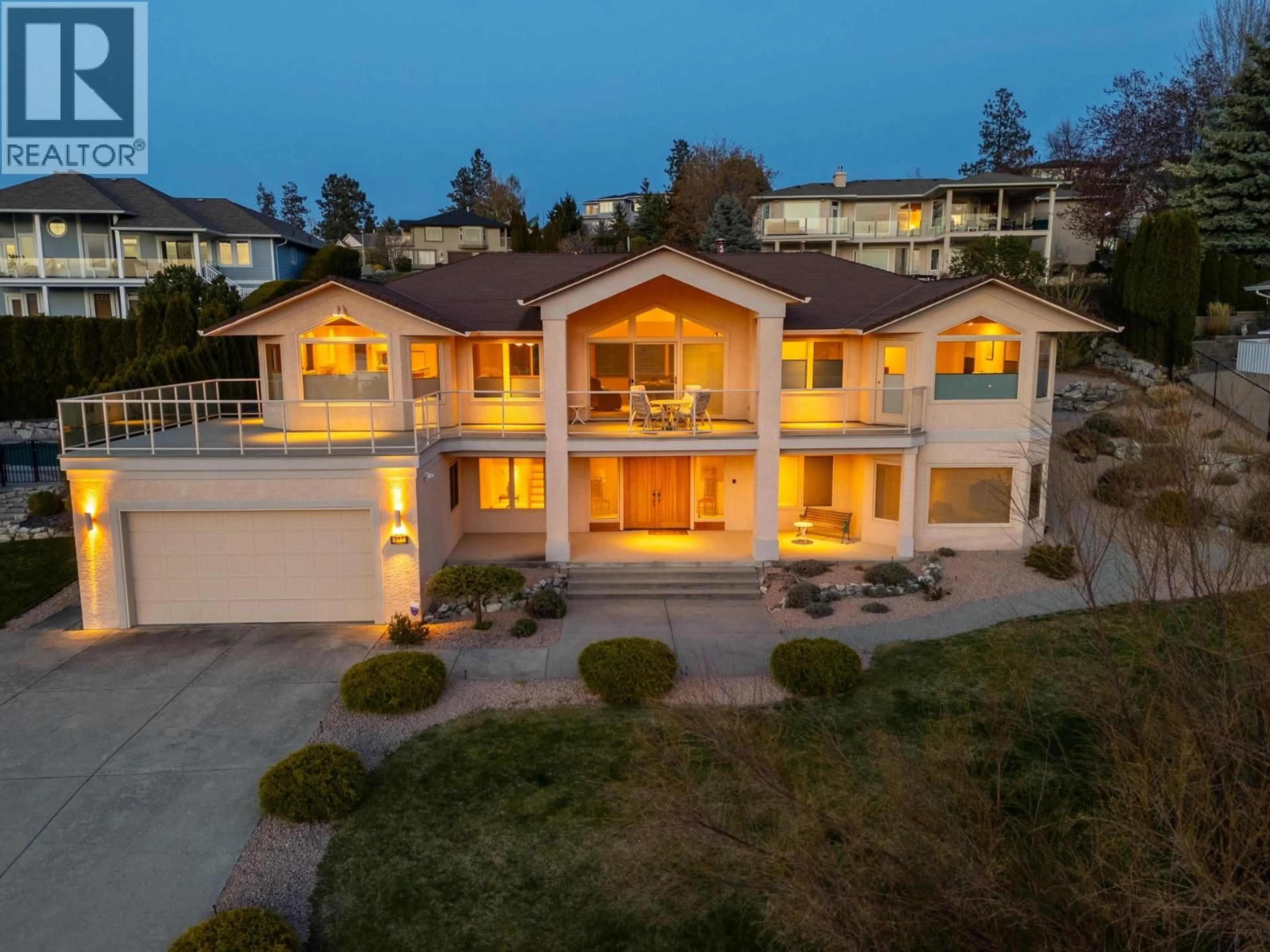 A pic from outside/outdoor area/front of a property/back of a property/a pic from drone, street for 307 SANDPIPER COURT, Kelowna British Columbia V1W4K7