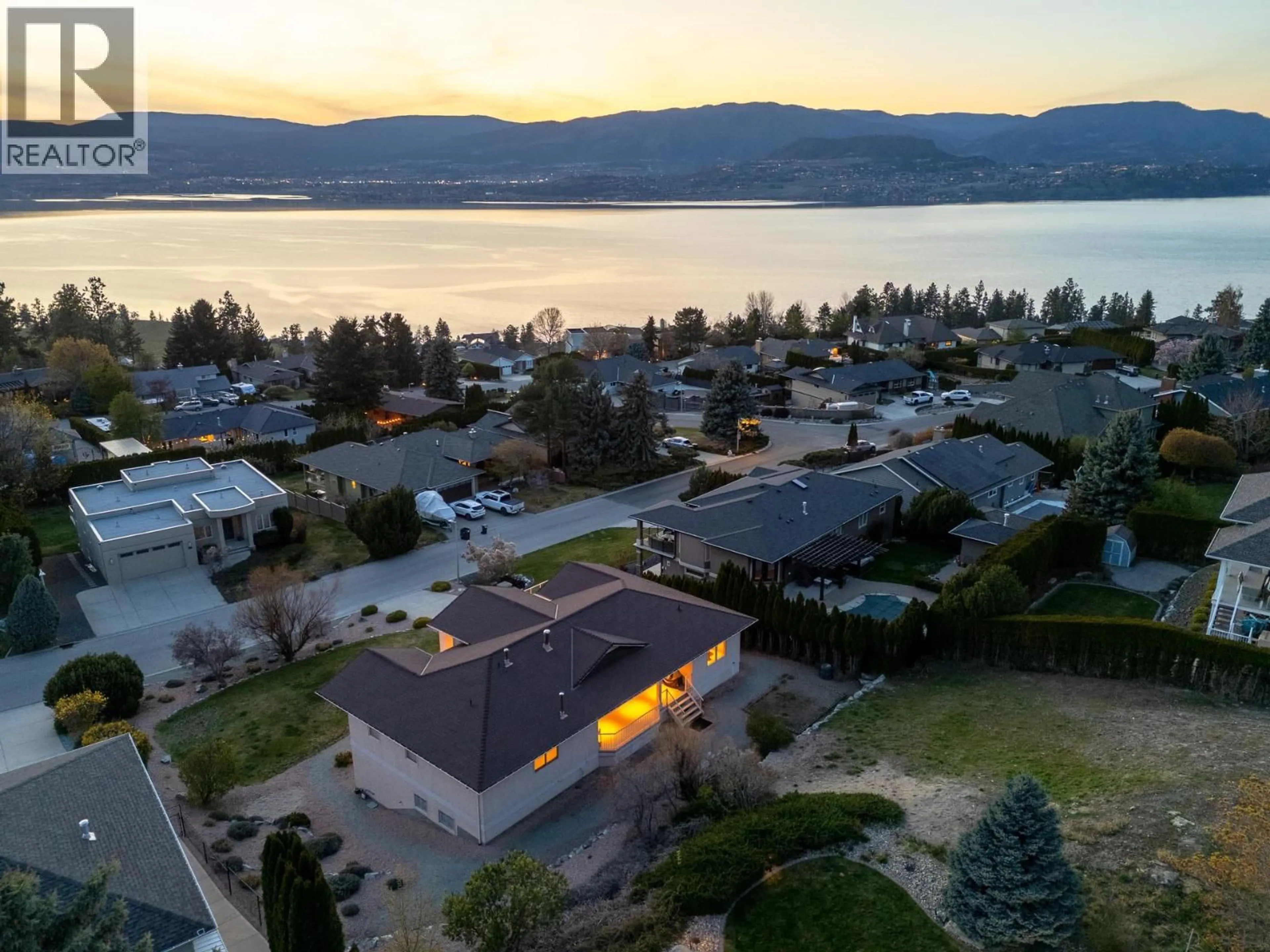 A pic from outside/outdoor area/front of a property/back of a property/a pic from drone, water/lake/river/ocean view for 307 SANDPIPER COURT, Kelowna British Columbia V1W4K7