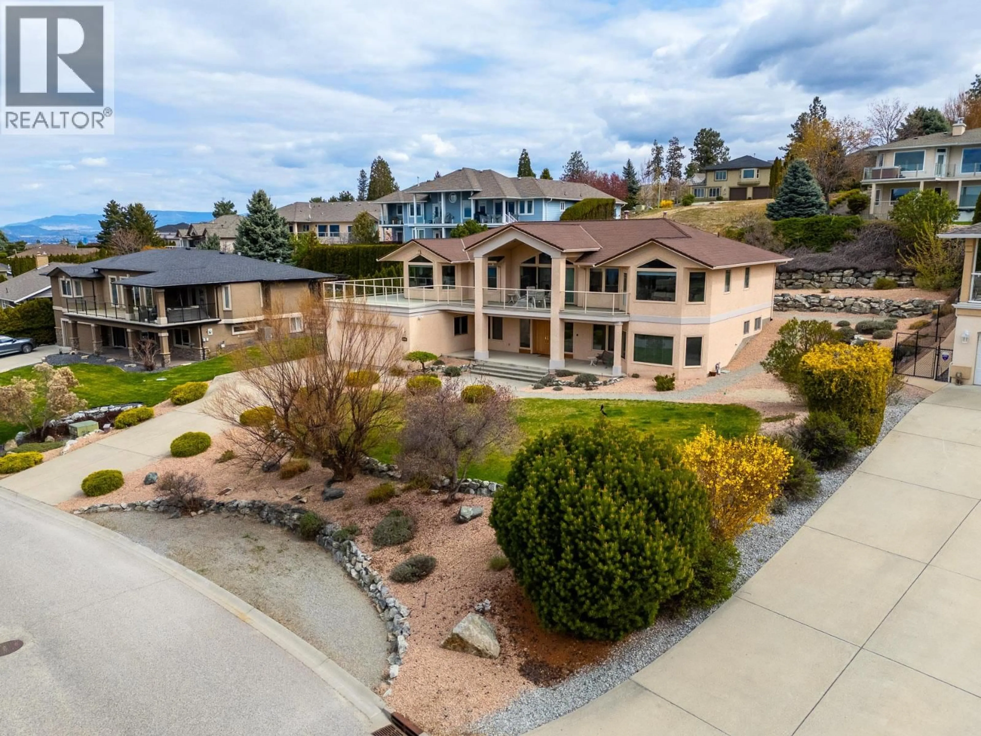 A pic from outside/outdoor area/front of a property/back of a property/a pic from drone, unknown for 307 SANDPIPER COURT, Kelowna British Columbia V1W4K7