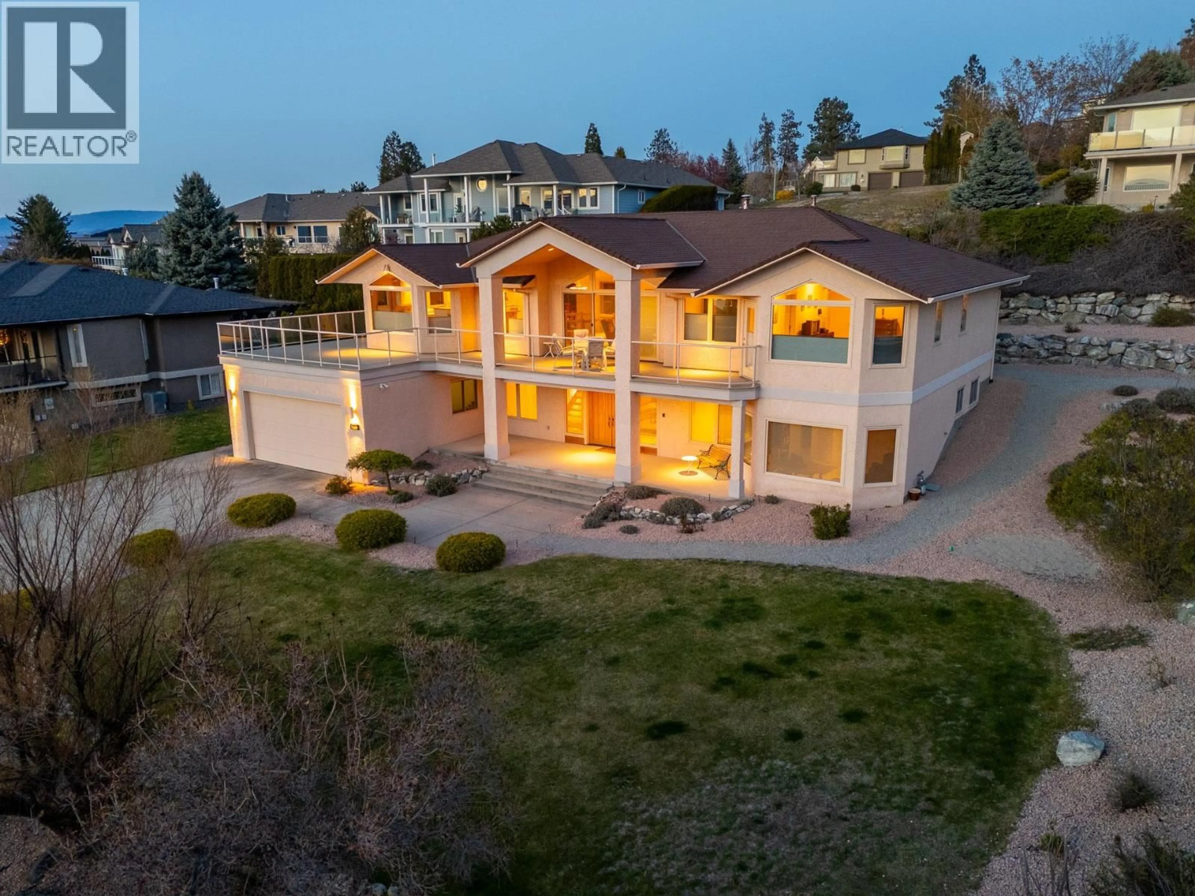 A pic from outside/outdoor area/front of a property/back of a property/a pic from drone, unknown for 307 SANDPIPER COURT, Kelowna British Columbia V1W4K7