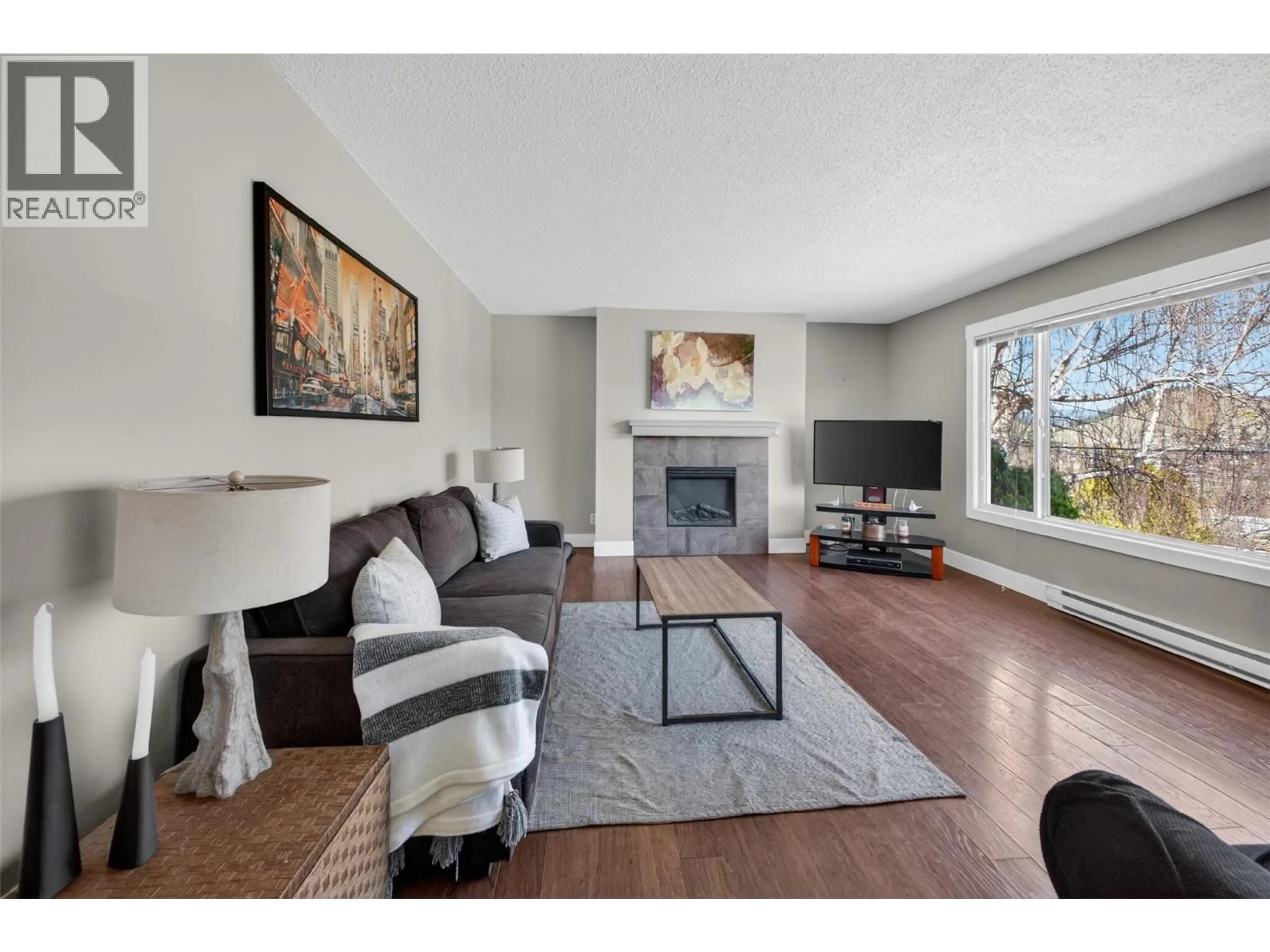 Living room with furniture, unknown for 2126 VERDE VISTA ROAD, Kelowna British Columbia V1P1G5