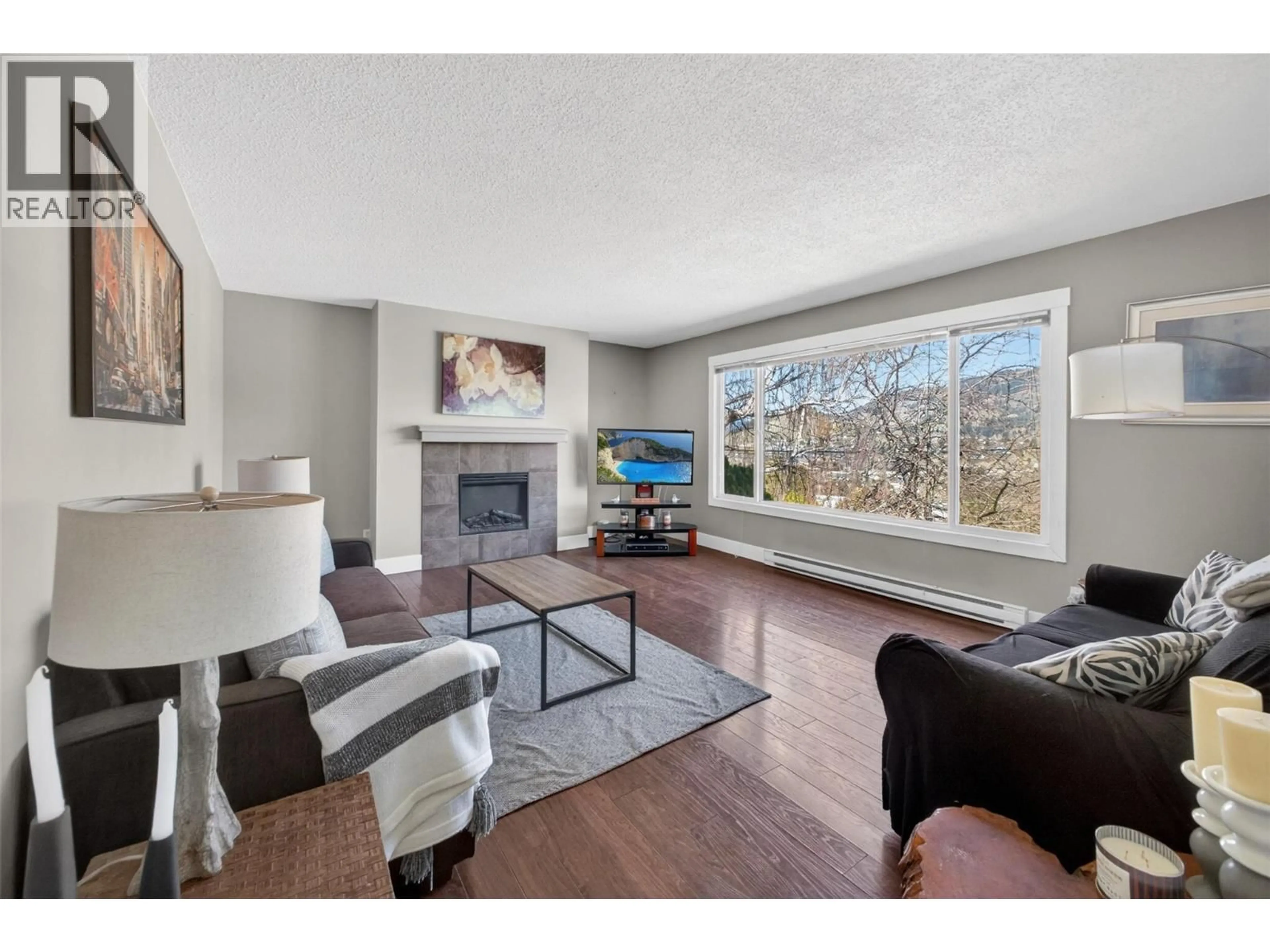 Living room with furniture, unknown for 2126 VERDE VISTA ROAD, Kelowna British Columbia V1P1G5