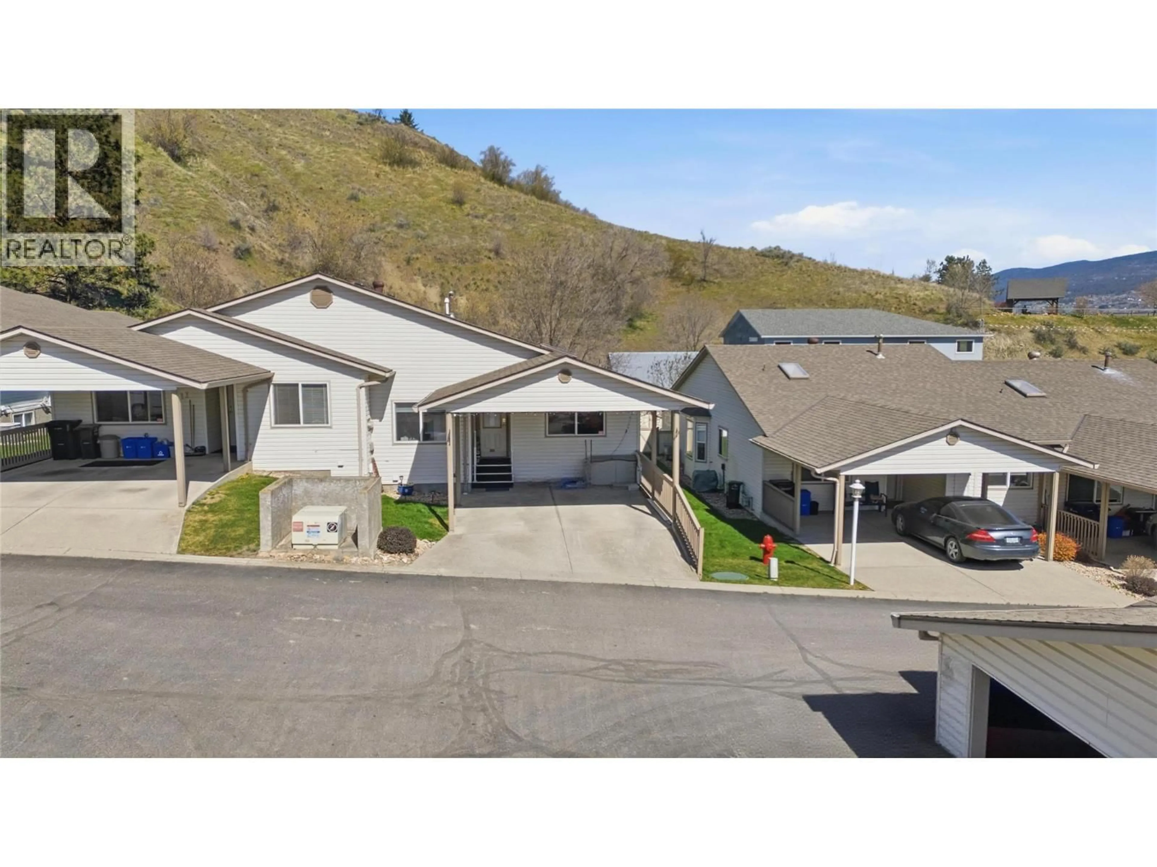 A pic from outside/outdoor area/front of a property/back of a property/a pic from drone, mountain view for 10 - 4210 ALEXIS PARK DRIVE, Vernon British Columbia V1T6H3