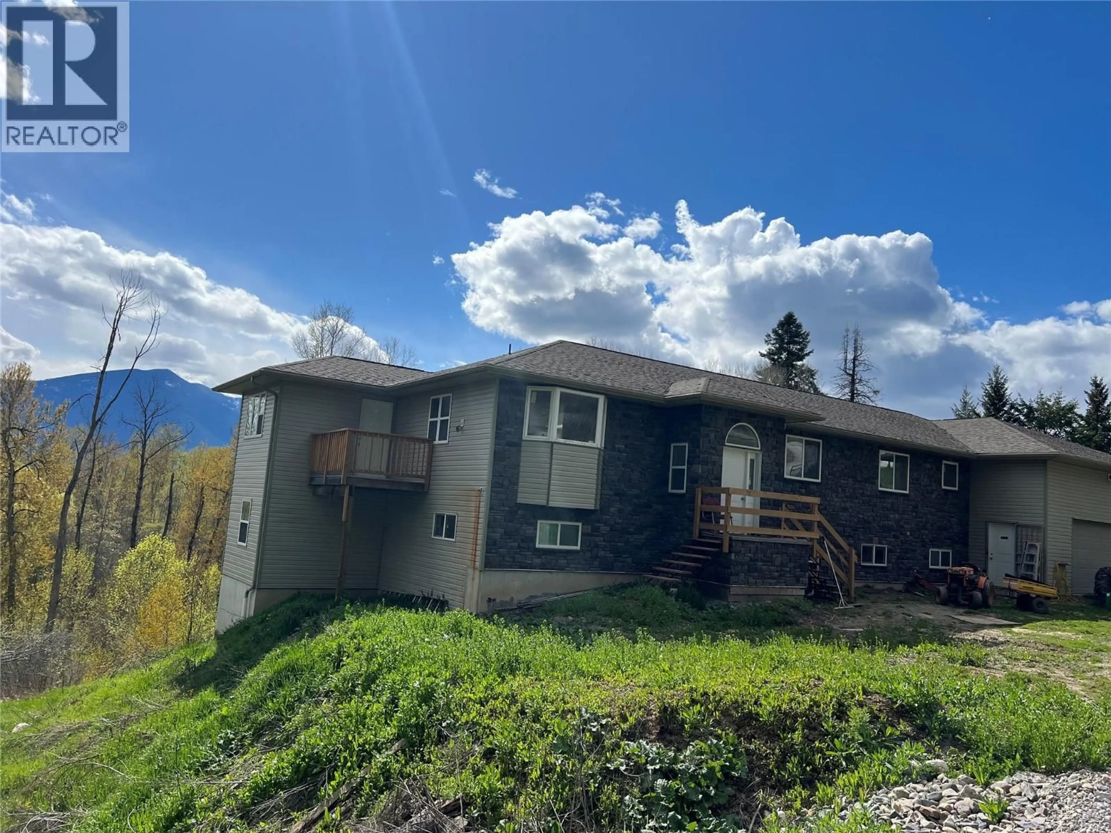 A pic from outside/outdoor area/front of a property/back of a property/a pic from drone, mountain view for 5423 3A HIGHWAY, Wynndel British Columbia V0B2N0