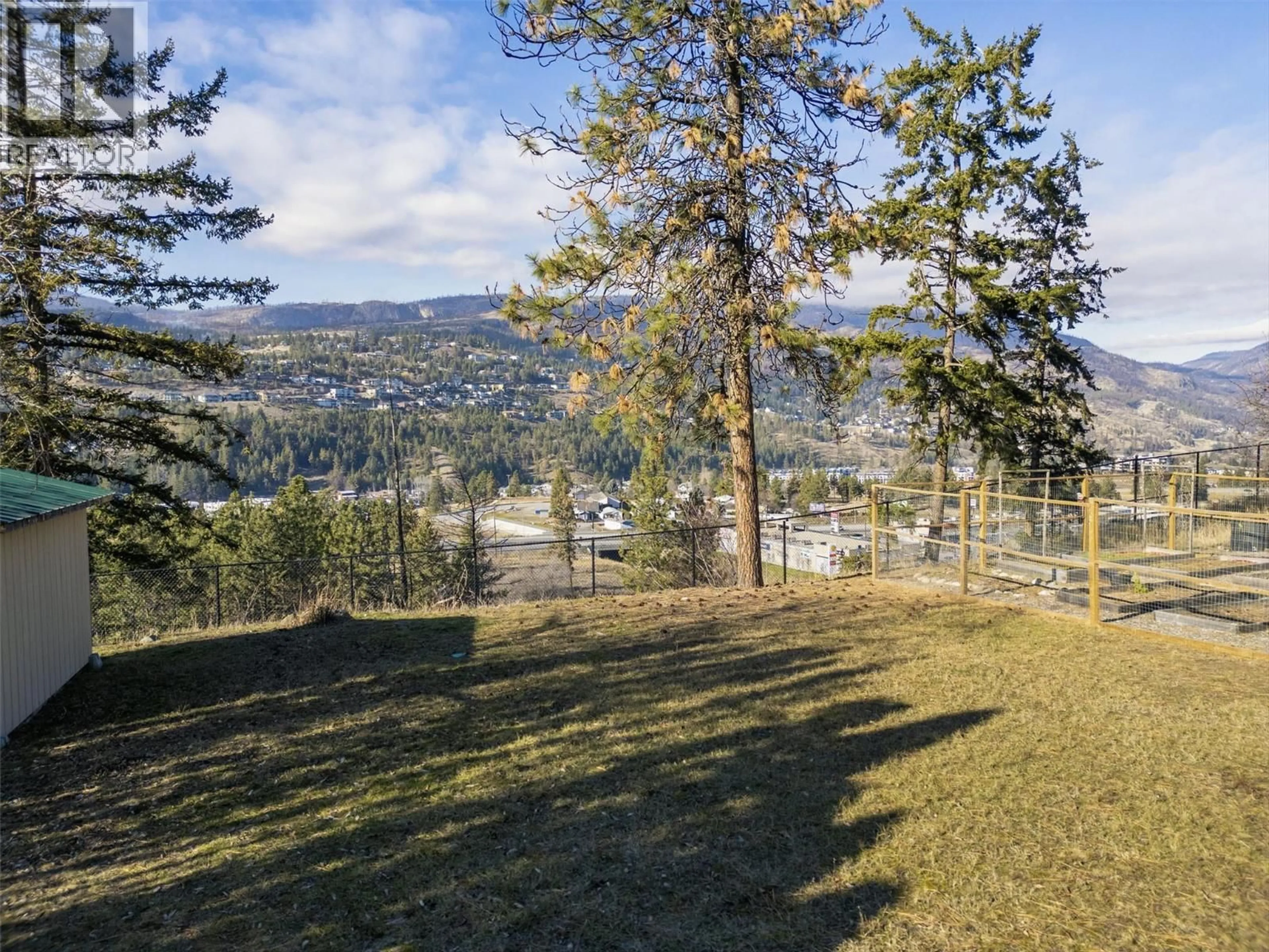 A pic from outside/outdoor area/front of a property/back of a property/a pic from drone, forest/trees view for 2094 TOMAT AVENUE, West Kelowna British Columbia V1Z3J2