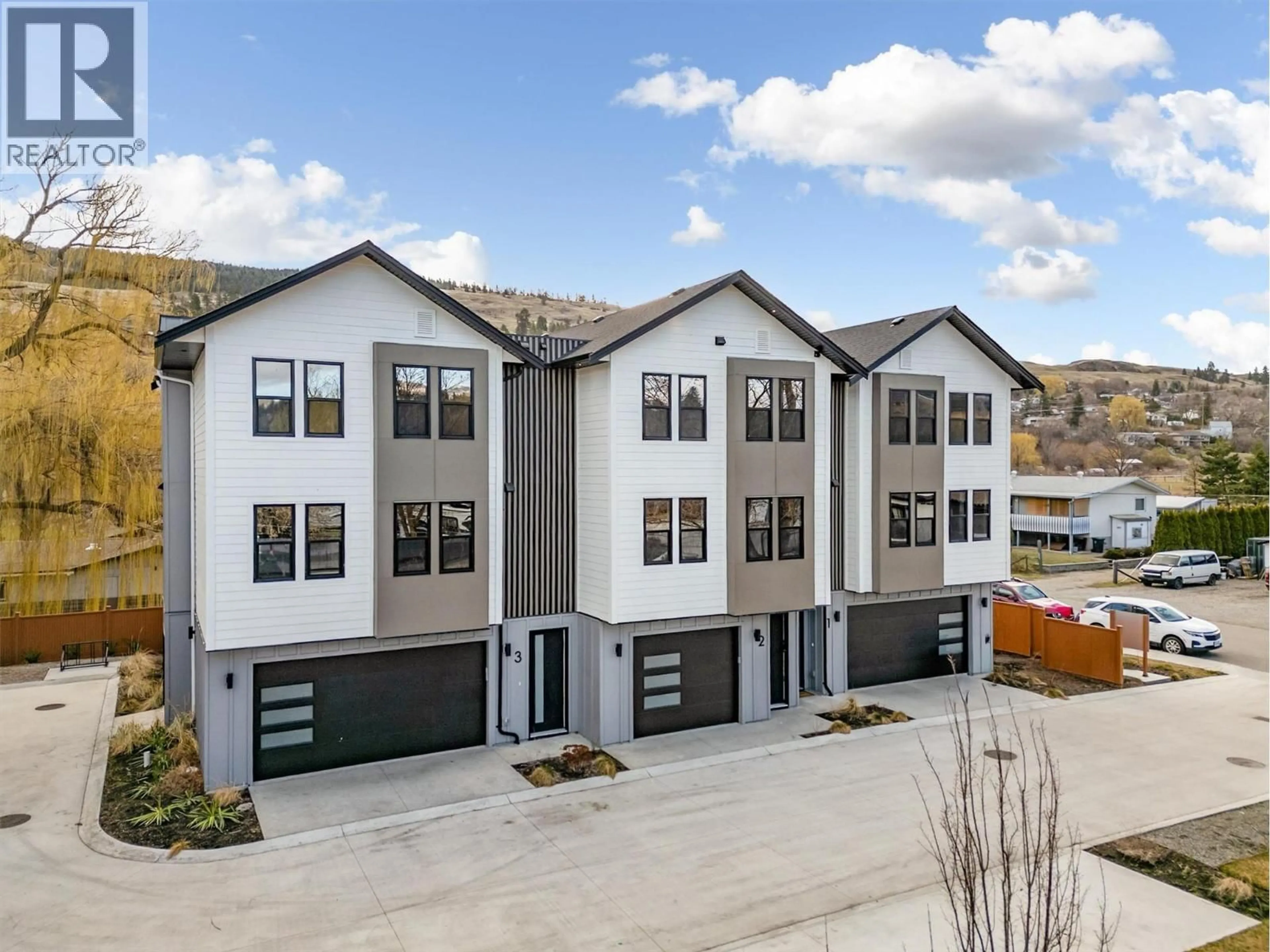 A pic from outside/outdoor area/front of a property/back of a property/a pic from drone, street for 3 - 3590 REDECOPP ROAD, Lake Country British Columbia V4V1X5