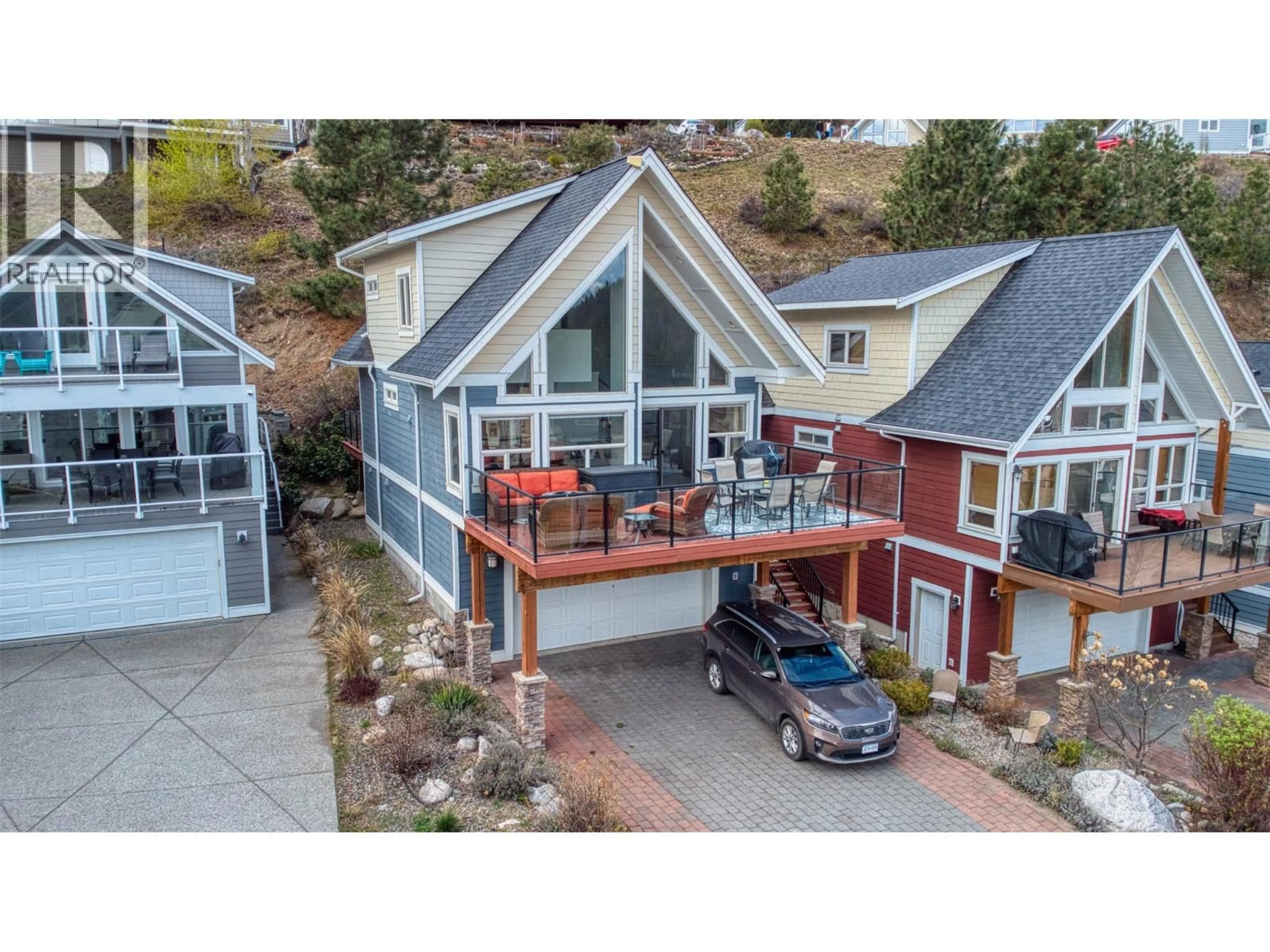 A pic from outside/outdoor area/front of a property/back of a property/a pic from drone, unknown for 220 - 6765 LA PALMA LOOP, Kelowna British Columbia V1Z3R8