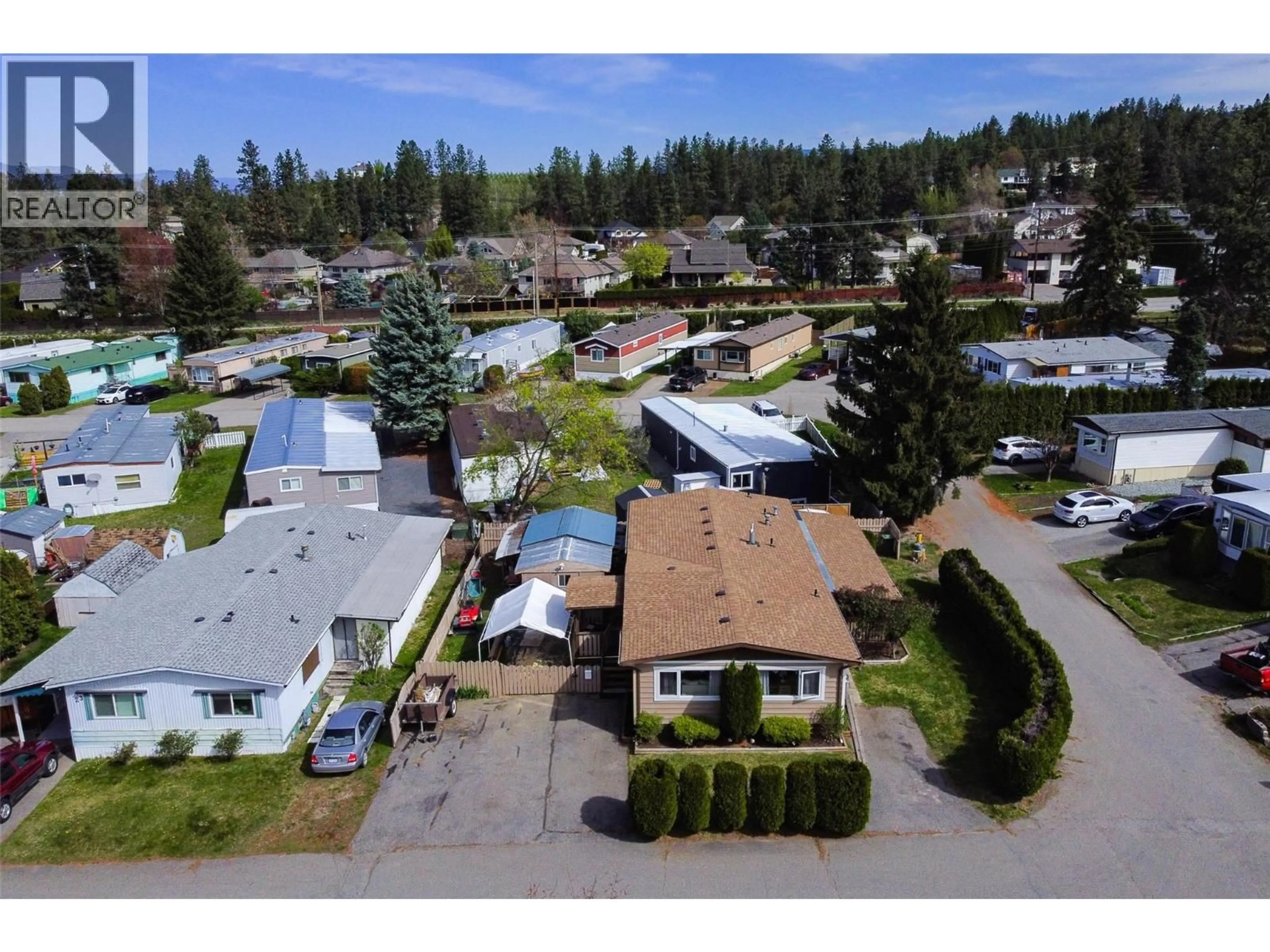A pic from outside/outdoor area/front of a property/back of a property/a pic from drone, street for 22 - 3535 MCCULLOCH ROAD, Kelowna British Columbia V1W4R8