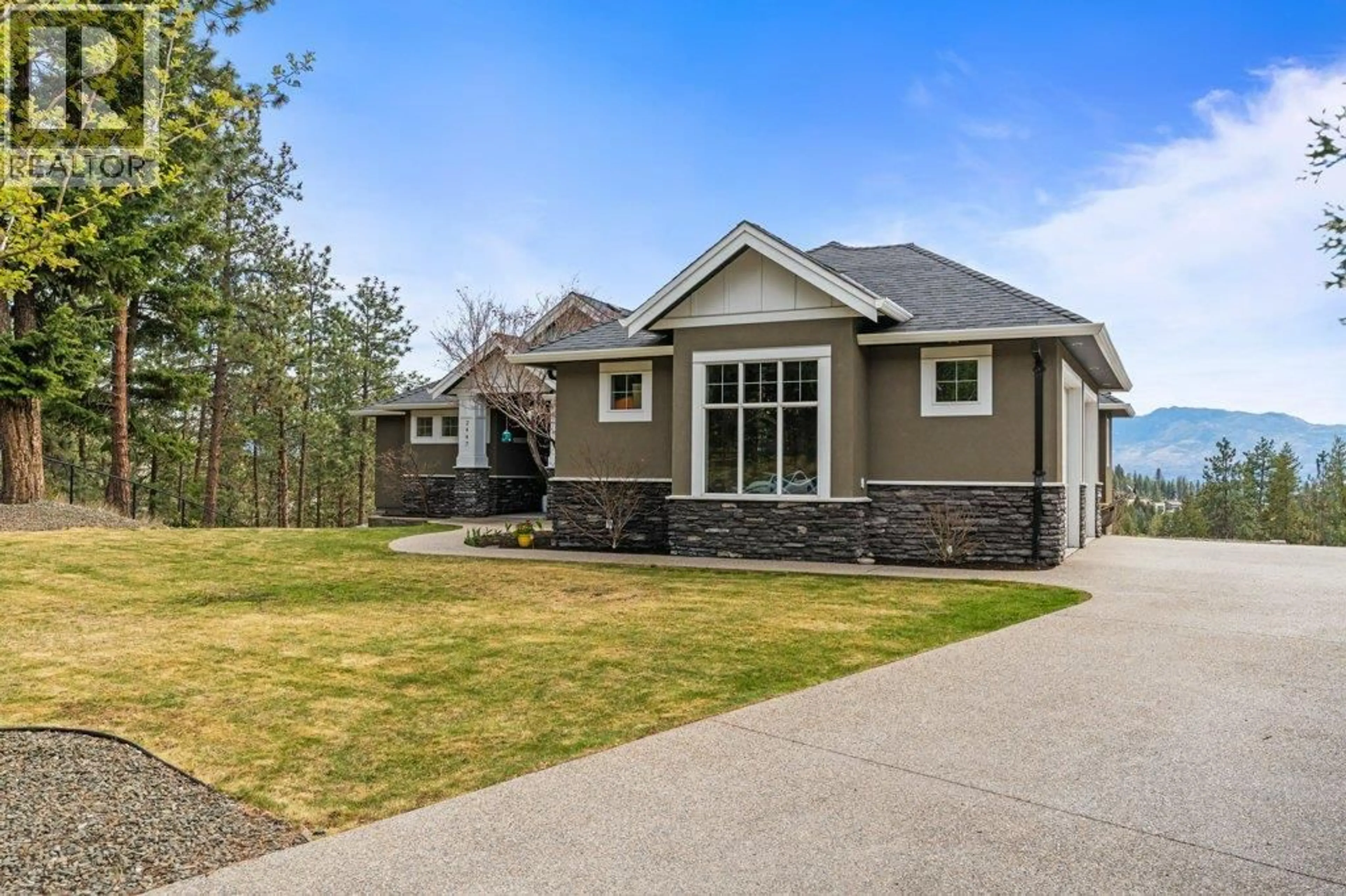 Home with vinyl exterior material, street for 2447 STONE GROVE CRESCENT, West Kelowna British Columbia V4T3A8