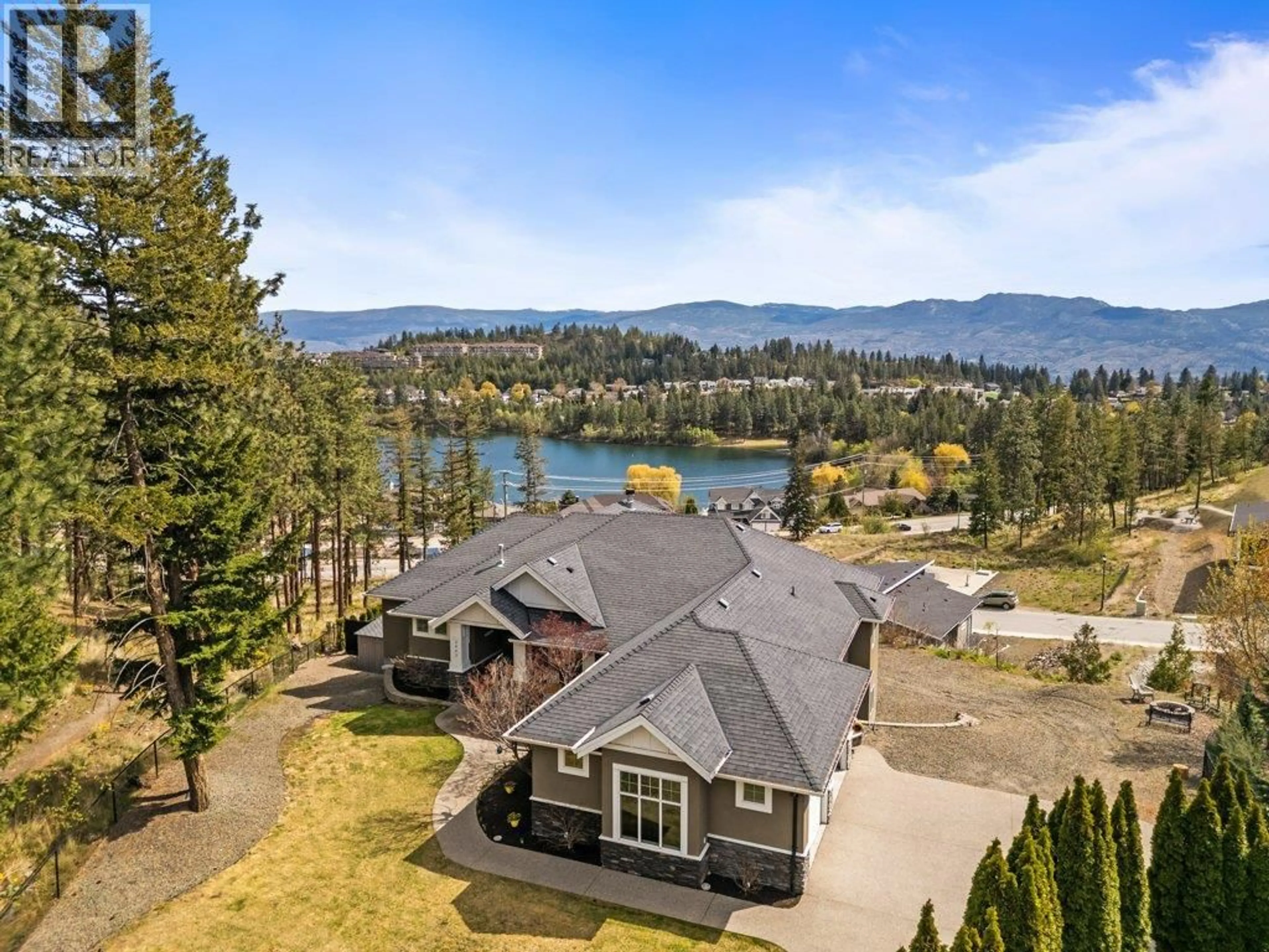 A pic from outside/outdoor area/front of a property/back of a property/a pic from drone, water/lake/river/ocean view for 2447 STONE GROVE CRESCENT, West Kelowna British Columbia V4T3A8
