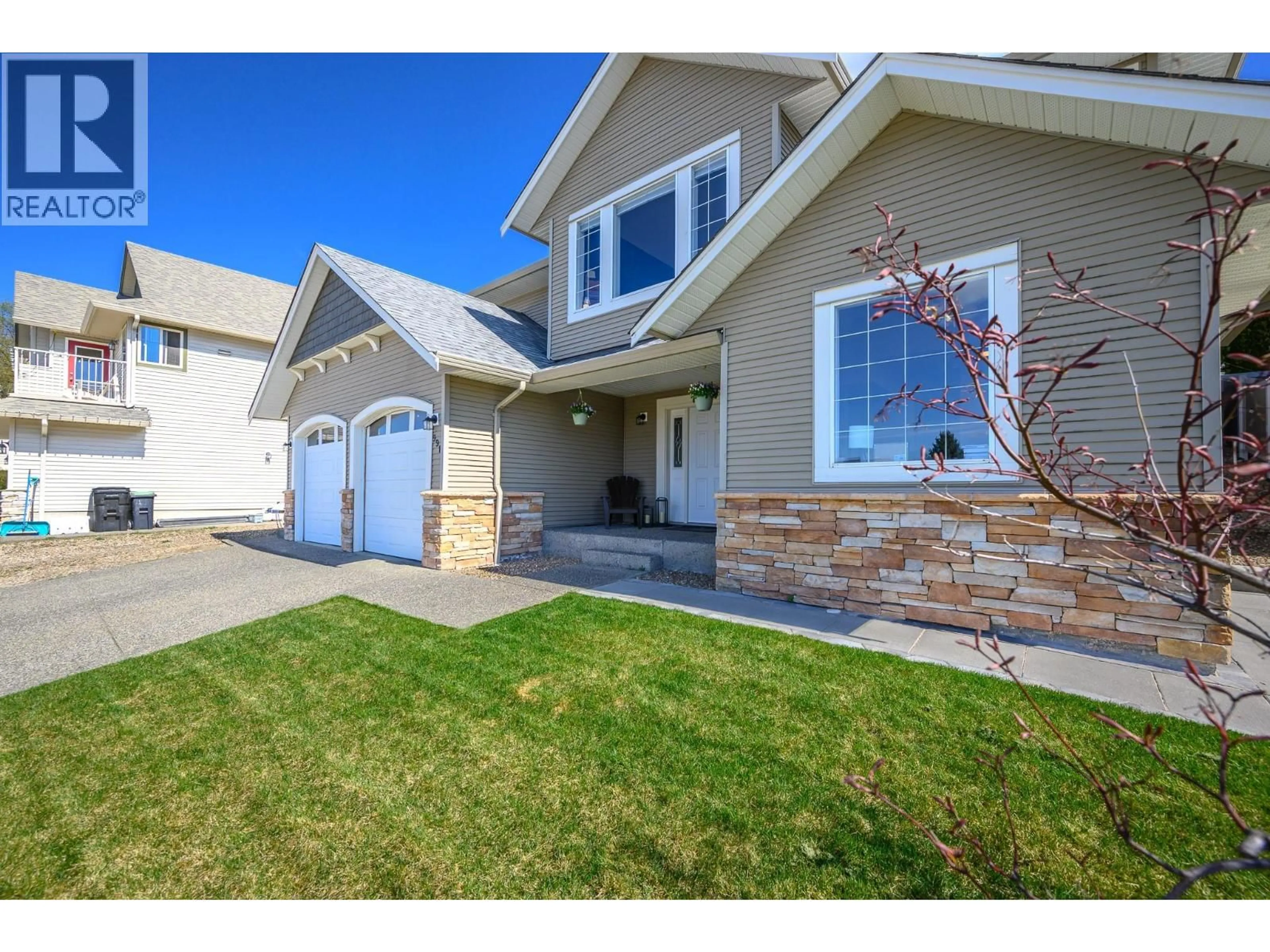 Home with vinyl exterior material, street for 991 MT BEGBIE DRIVE, Vernon British Columbia V1B2Z5