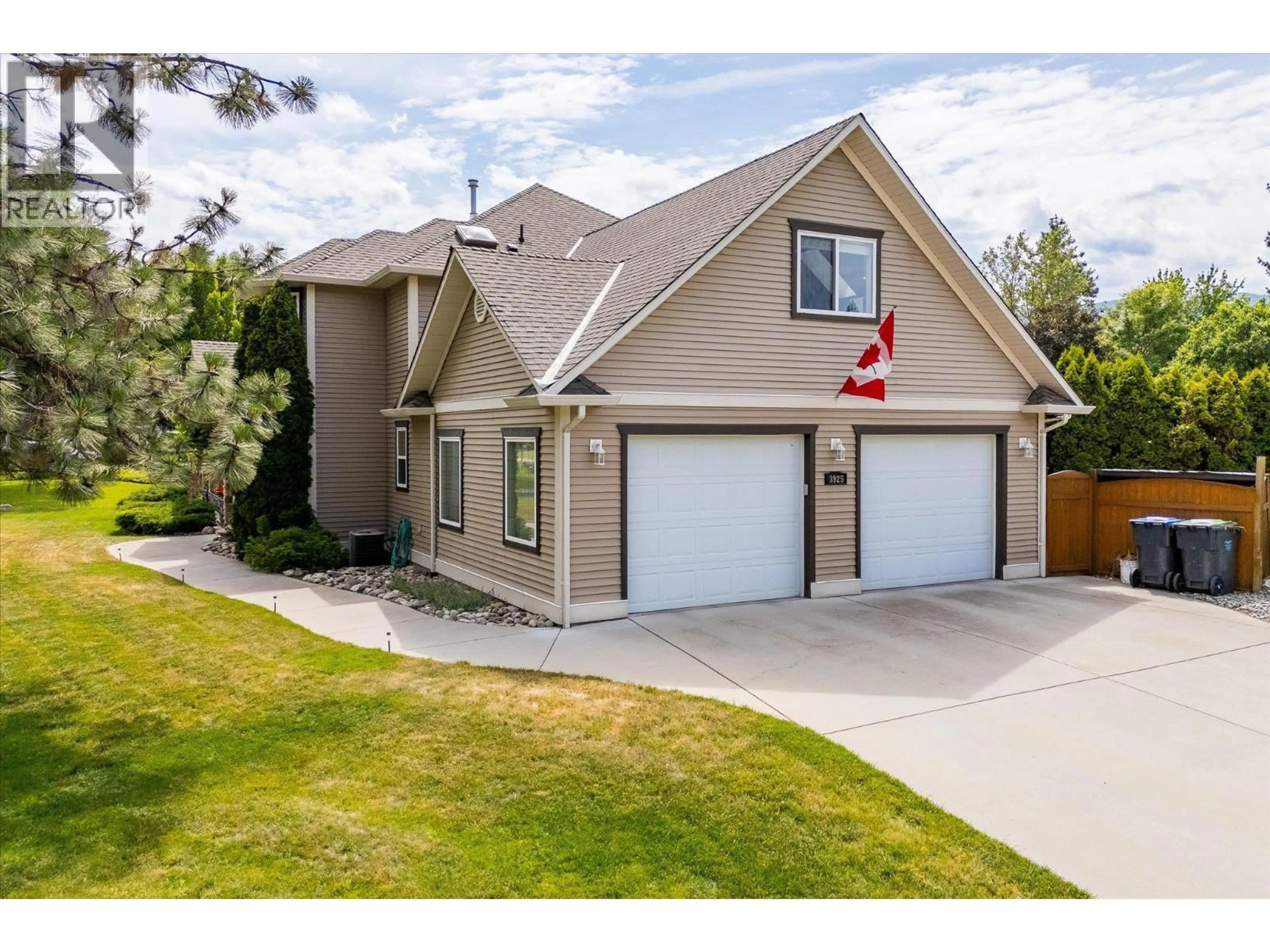Home with brick exterior material, street for 3925 FLOWER COURT, Kelowna British Columbia V1W4W2