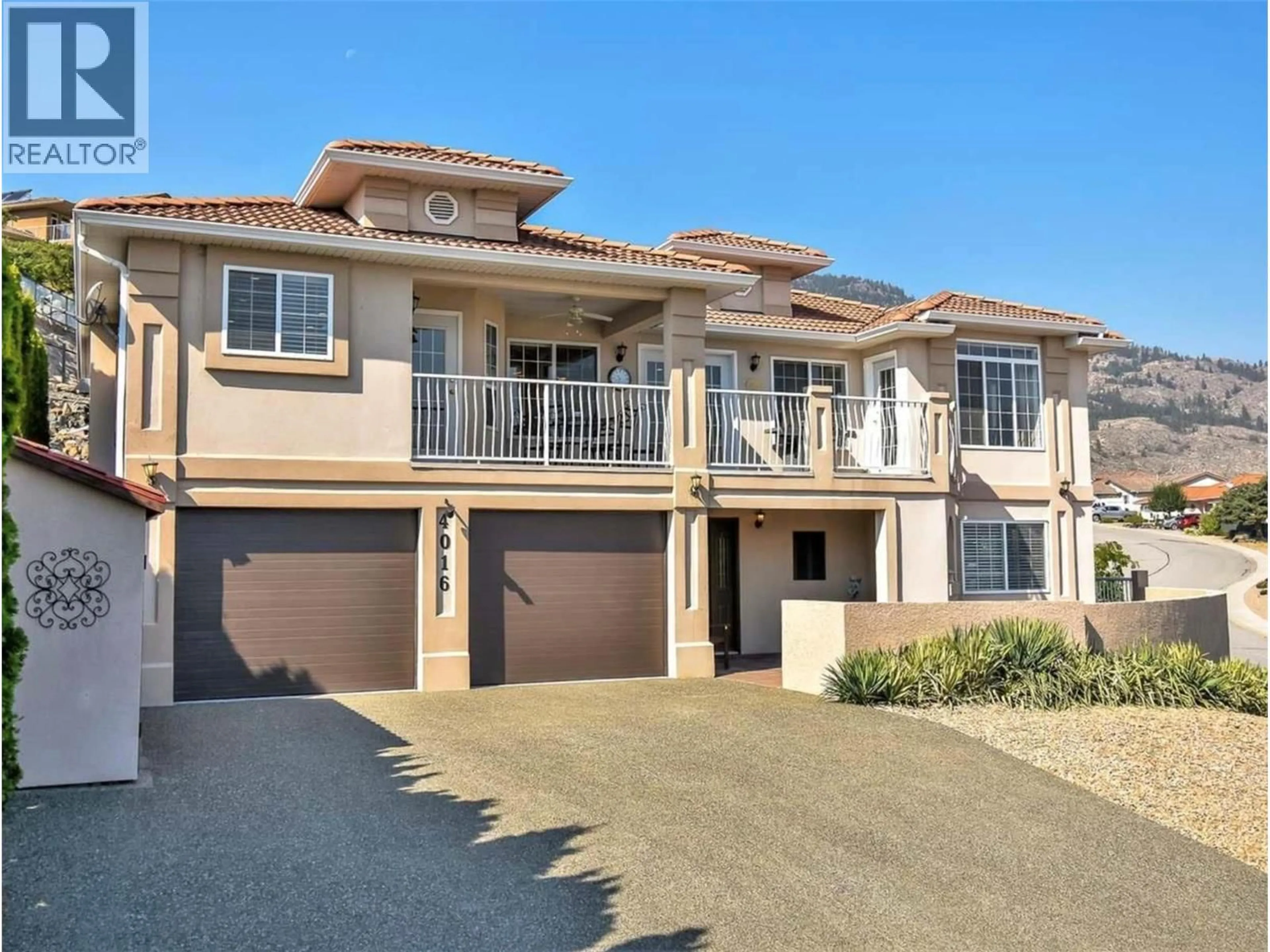 A pic from outside/outdoor area/front of a property/back of a property/a pic from drone, street for 4016 PEBBLE BEACH DRIVE, Osoyoos British Columbia V0H1V4