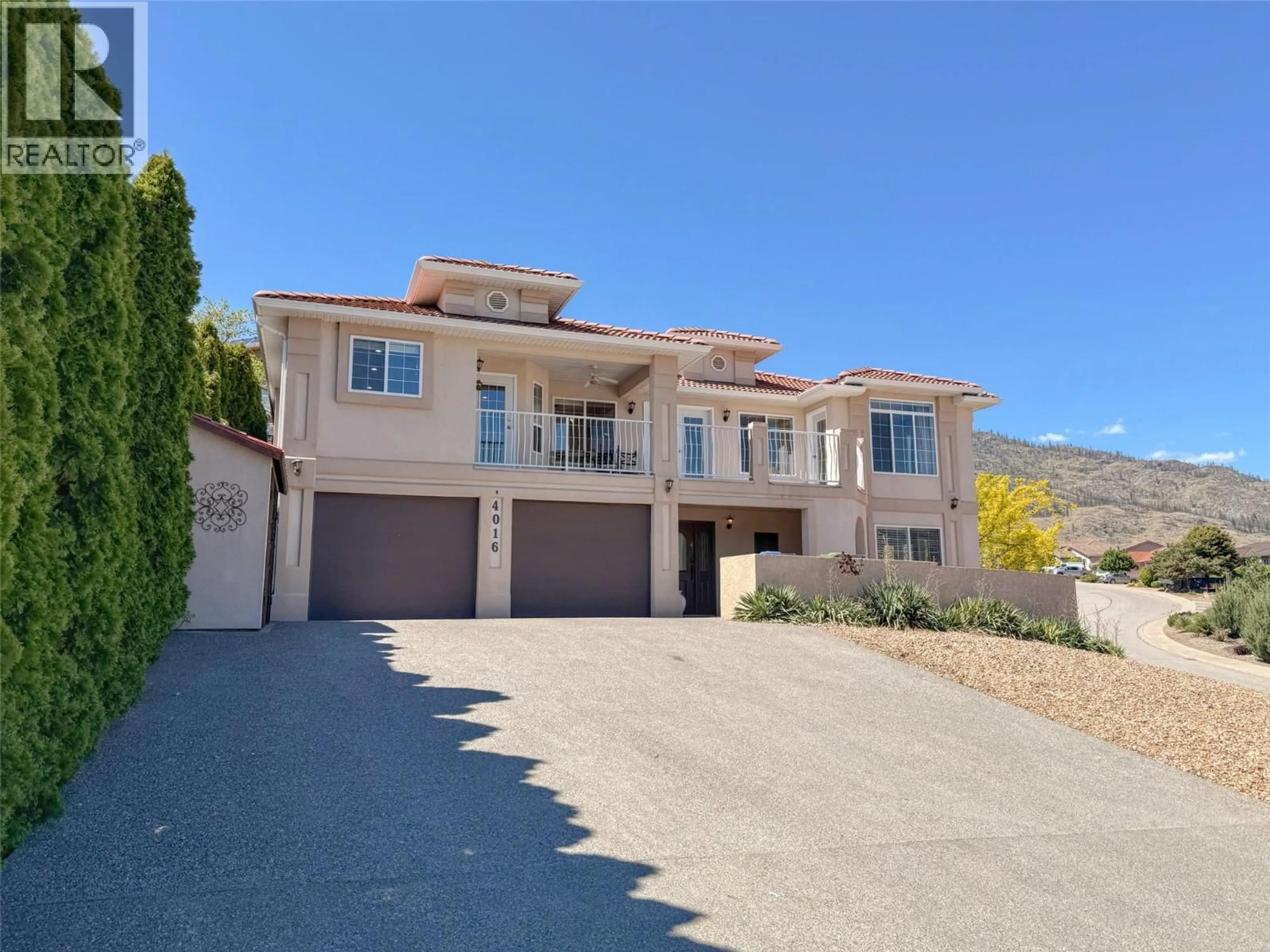 Home with vinyl exterior material, street for 4016 PEBBLE BEACH DRIVE, Osoyoos British Columbia V0H1V4
