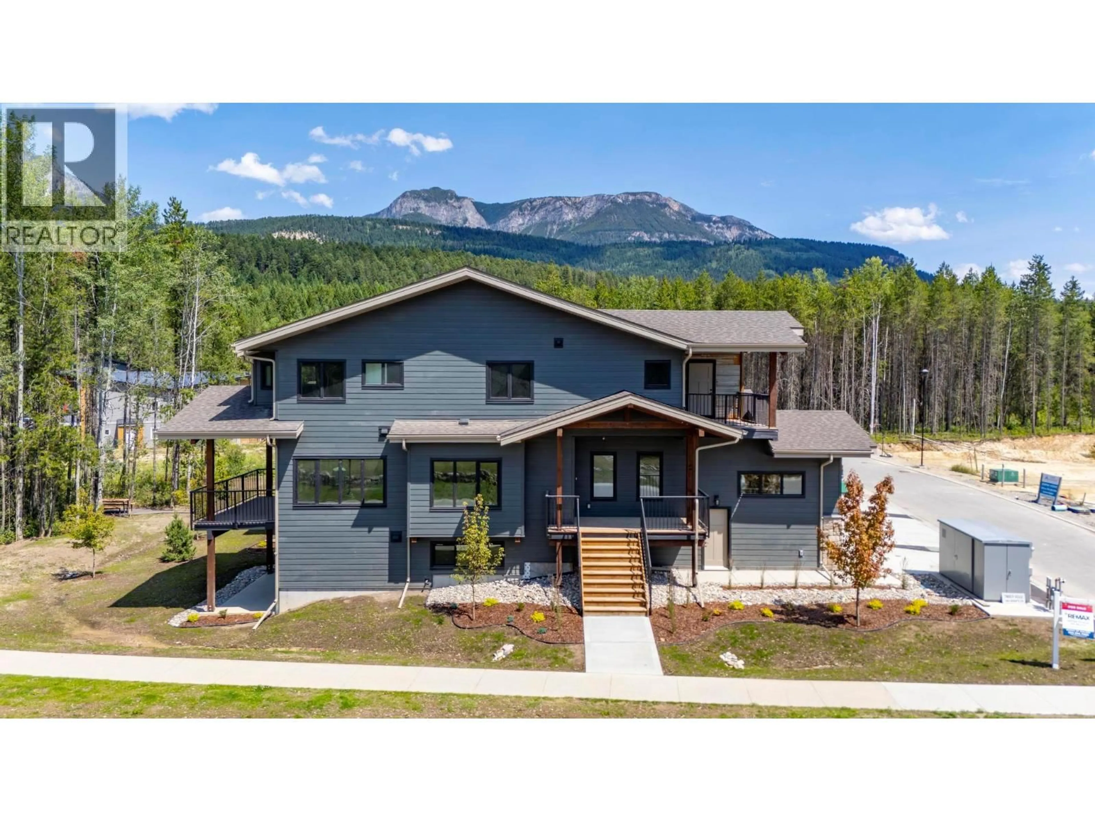 A pic from outside/outdoor area/front of a property/back of a property/a pic from drone, mountain view for 1 - 1444 GRANITE DRIVE, Golden British Columbia V0A1H0