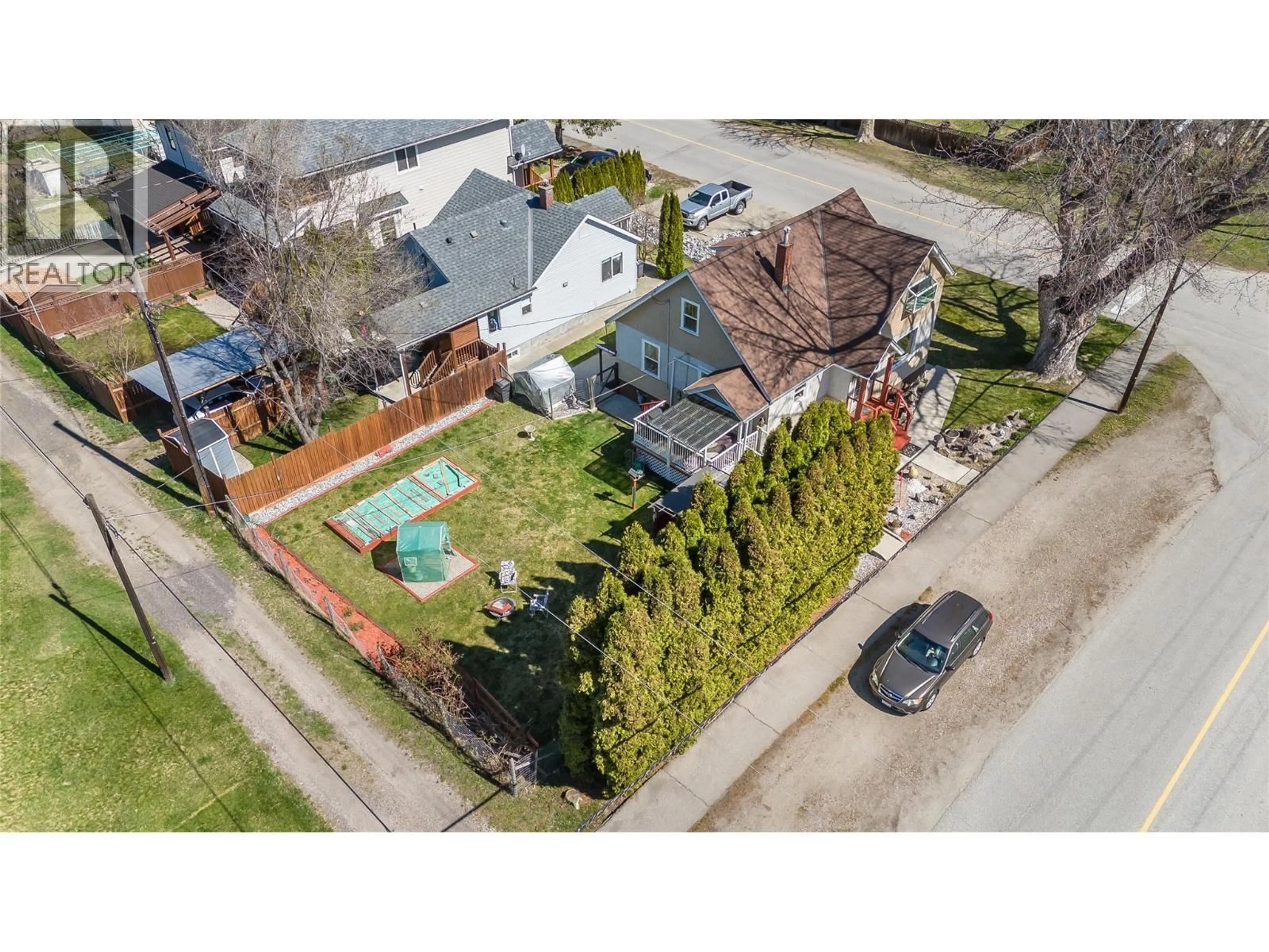 A pic from outside/outdoor area/front of a property/back of a property/a pic from drone, street for 701 4TH STREET, Castlegar British Columbia V1N2B7