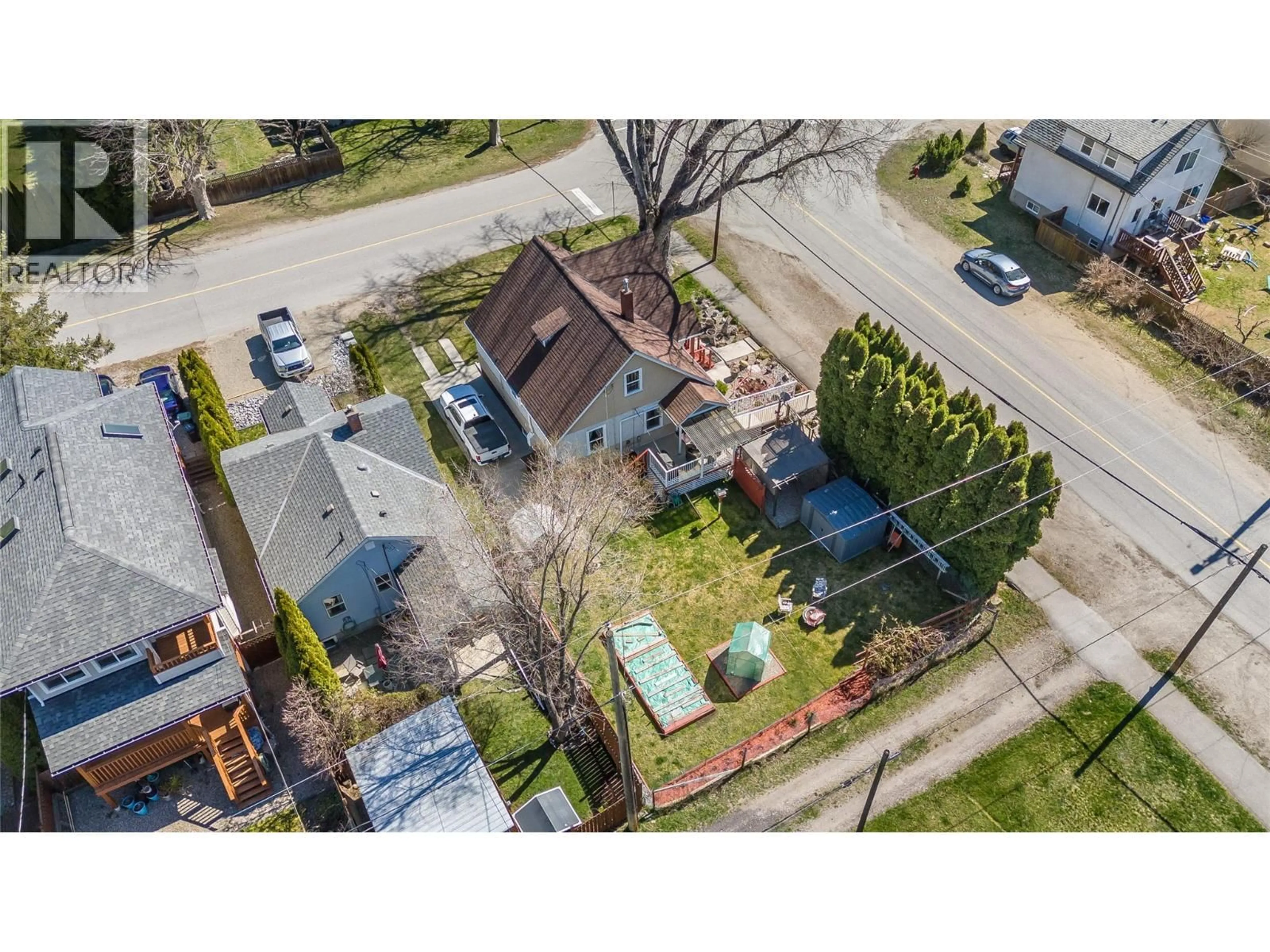 A pic from outside/outdoor area/front of a property/back of a property/a pic from drone, street for 701 4TH STREET, Castlegar British Columbia V1N2B7