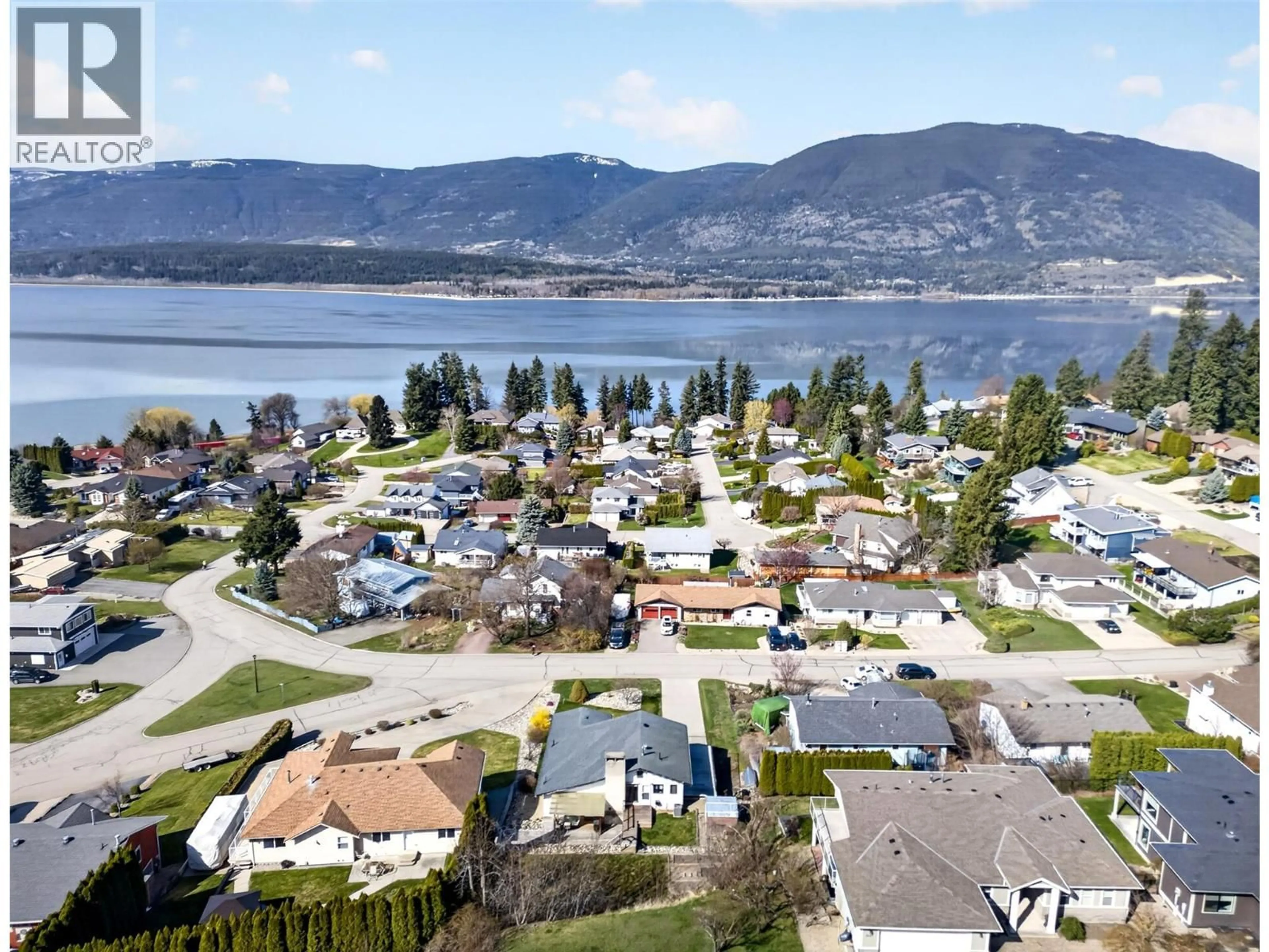 A pic from outside/outdoor area/front of a property/back of a property/a pic from drone, mountain view for 4860 14 STREET NORTHEAST, Salmon Arm British Columbia V1E3P2