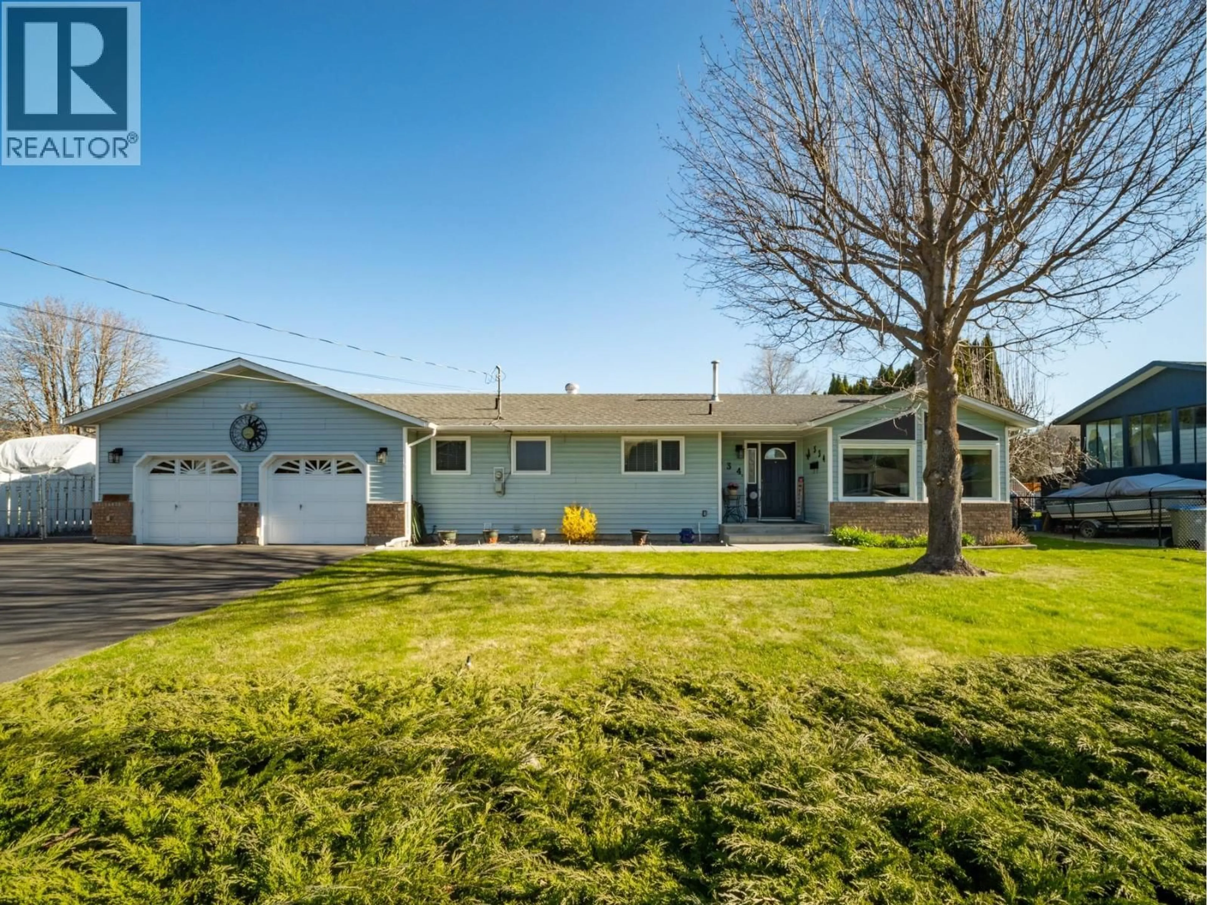 A pic from outside/outdoor area/front of a property/back of a property/a pic from drone, street for 334 CHILCO AVENUE, Kamloops British Columbia V2H1L9