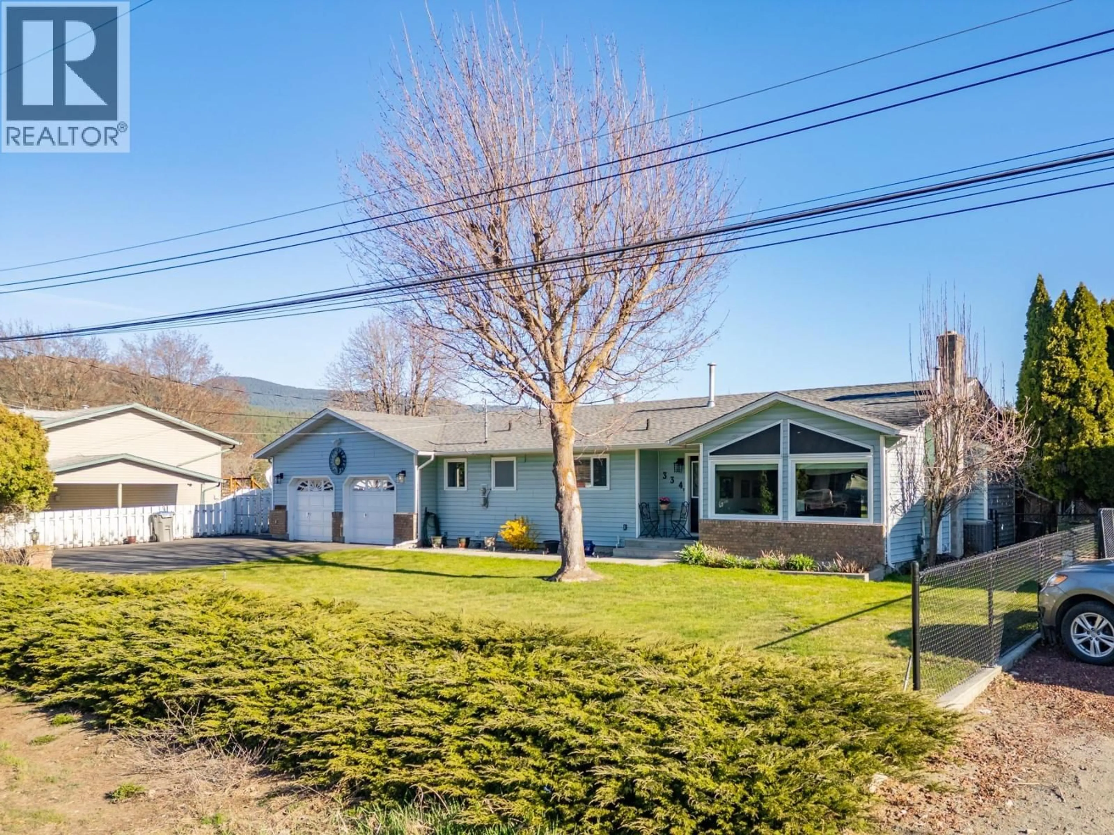 A pic from outside/outdoor area/front of a property/back of a property/a pic from drone, street for 334 CHILCO AVENUE, Kamloops British Columbia V2H1L9