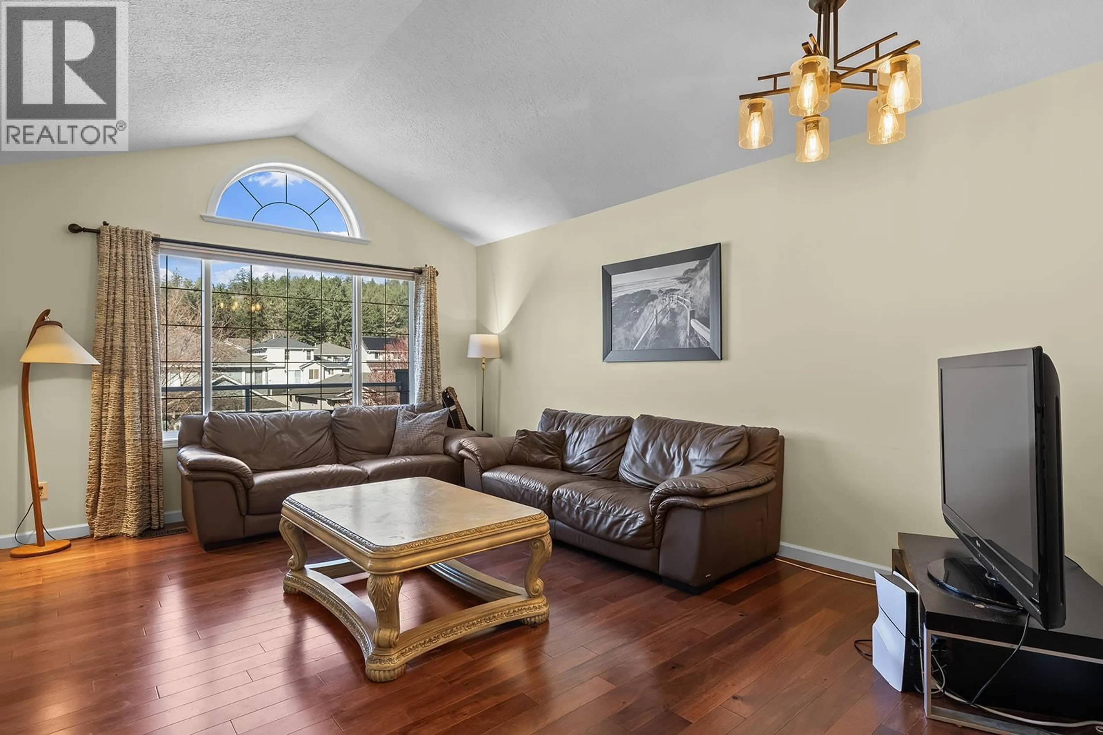 Living room with furniture, unknown for 413 RIO DRIVE, Kelowna British Columbia V1V2L2