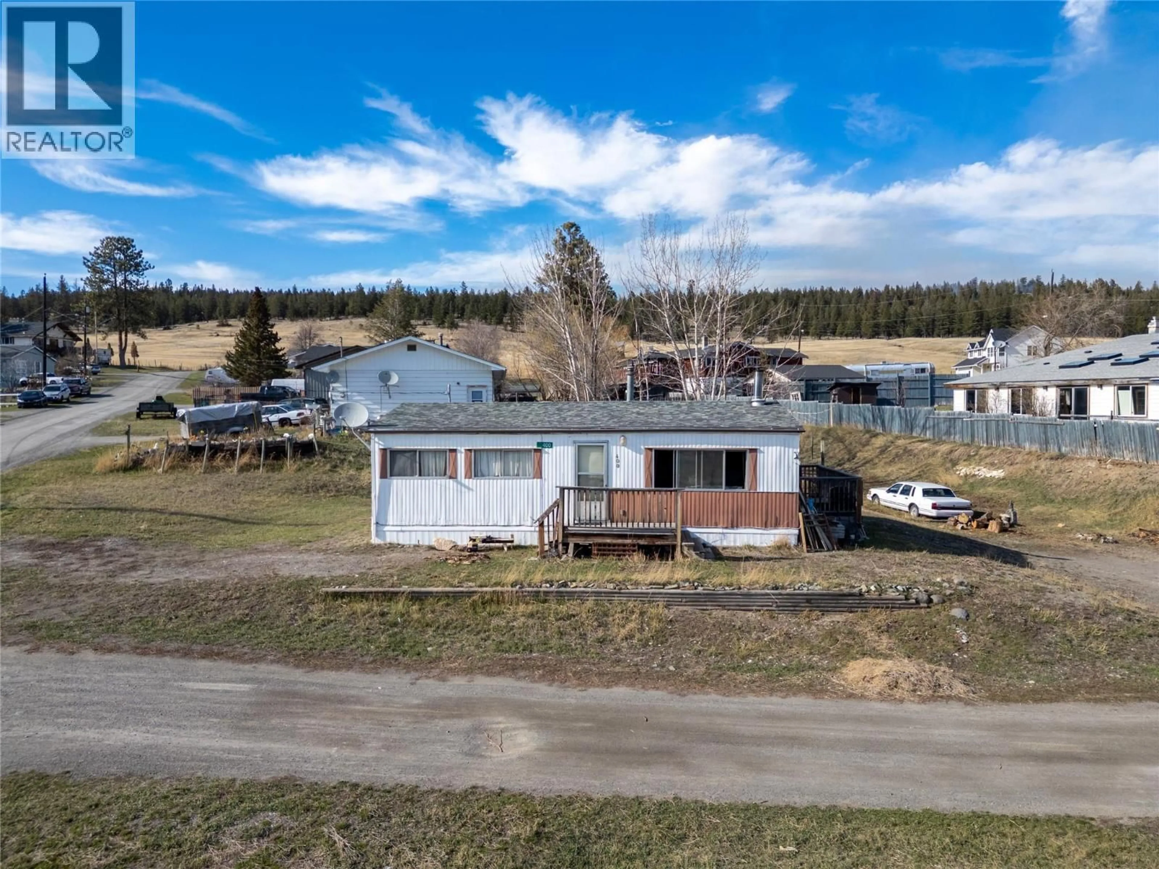 A pic from outside/outdoor area/front of a property/back of a property/a pic from drone, unknown for 400 FIR AVENUE, Clinton British Columbia V0K1K0