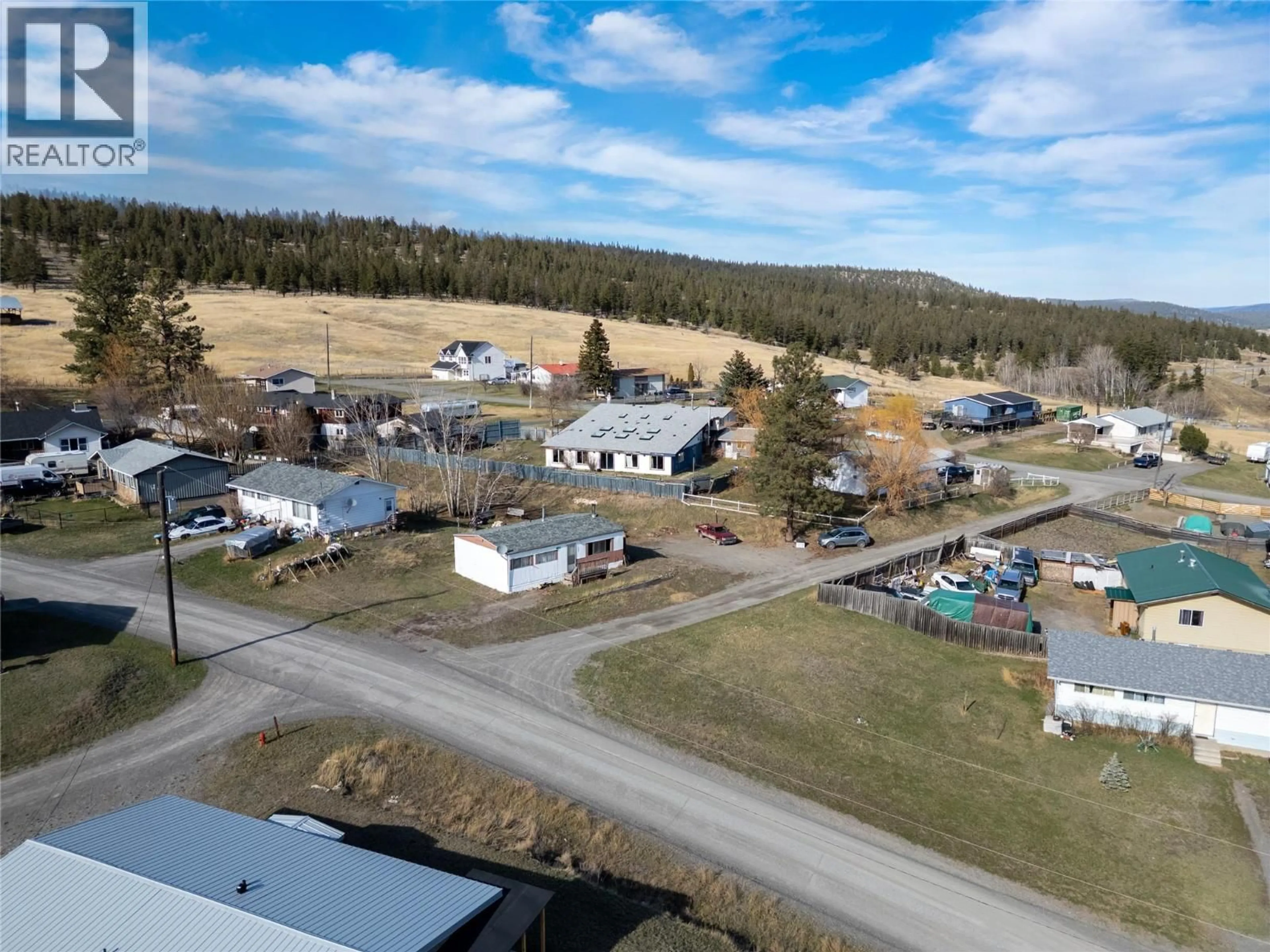 A pic from outside/outdoor area/front of a property/back of a property/a pic from drone, building for 400 FIR AVENUE, Clinton British Columbia V0K1K0