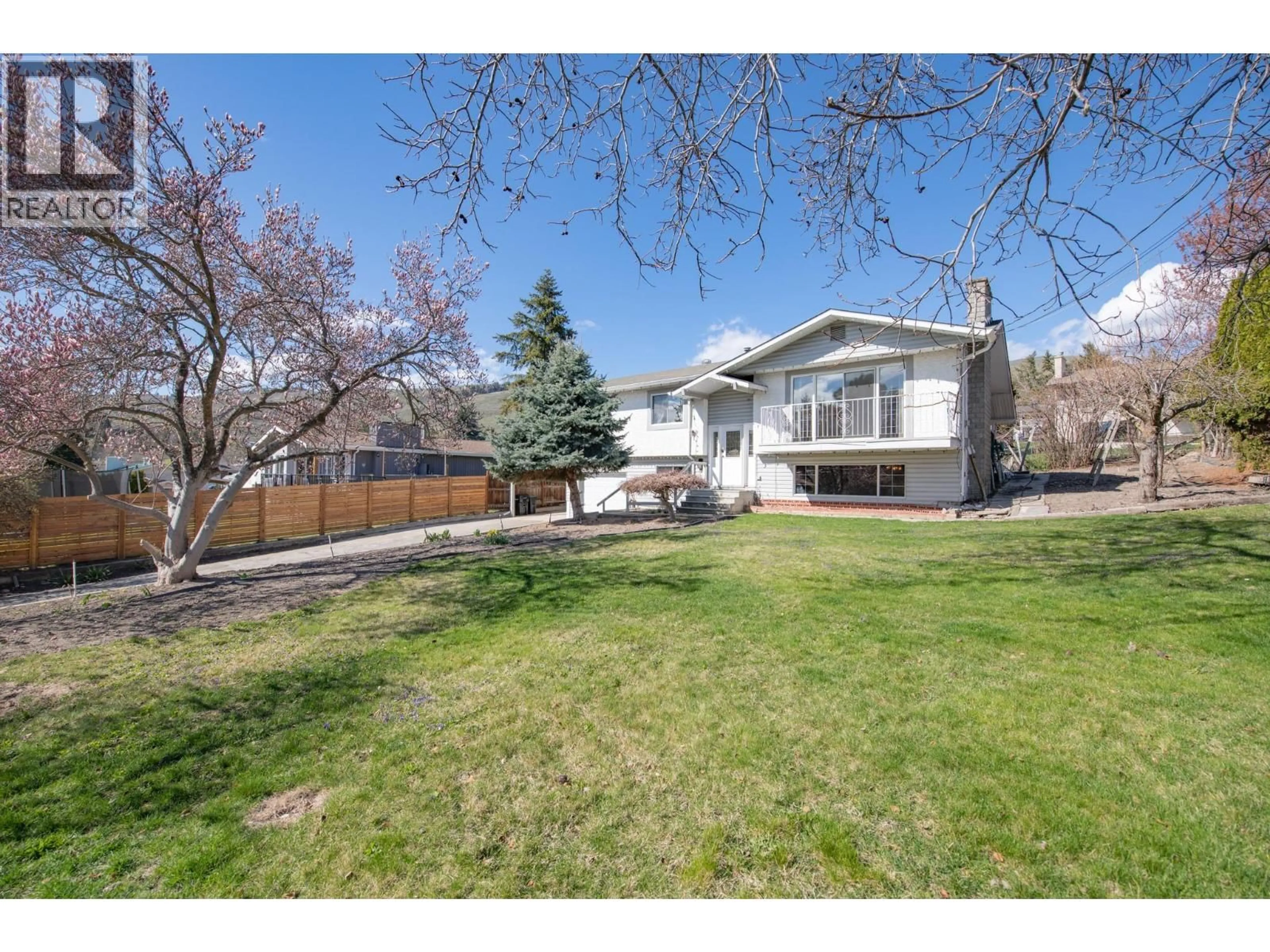 A pic from outside/outdoor area/front of a property/back of a property/a pic from drone, street for 5847 FLEMISH PLACE, Vernon British Columbia V1H1B2