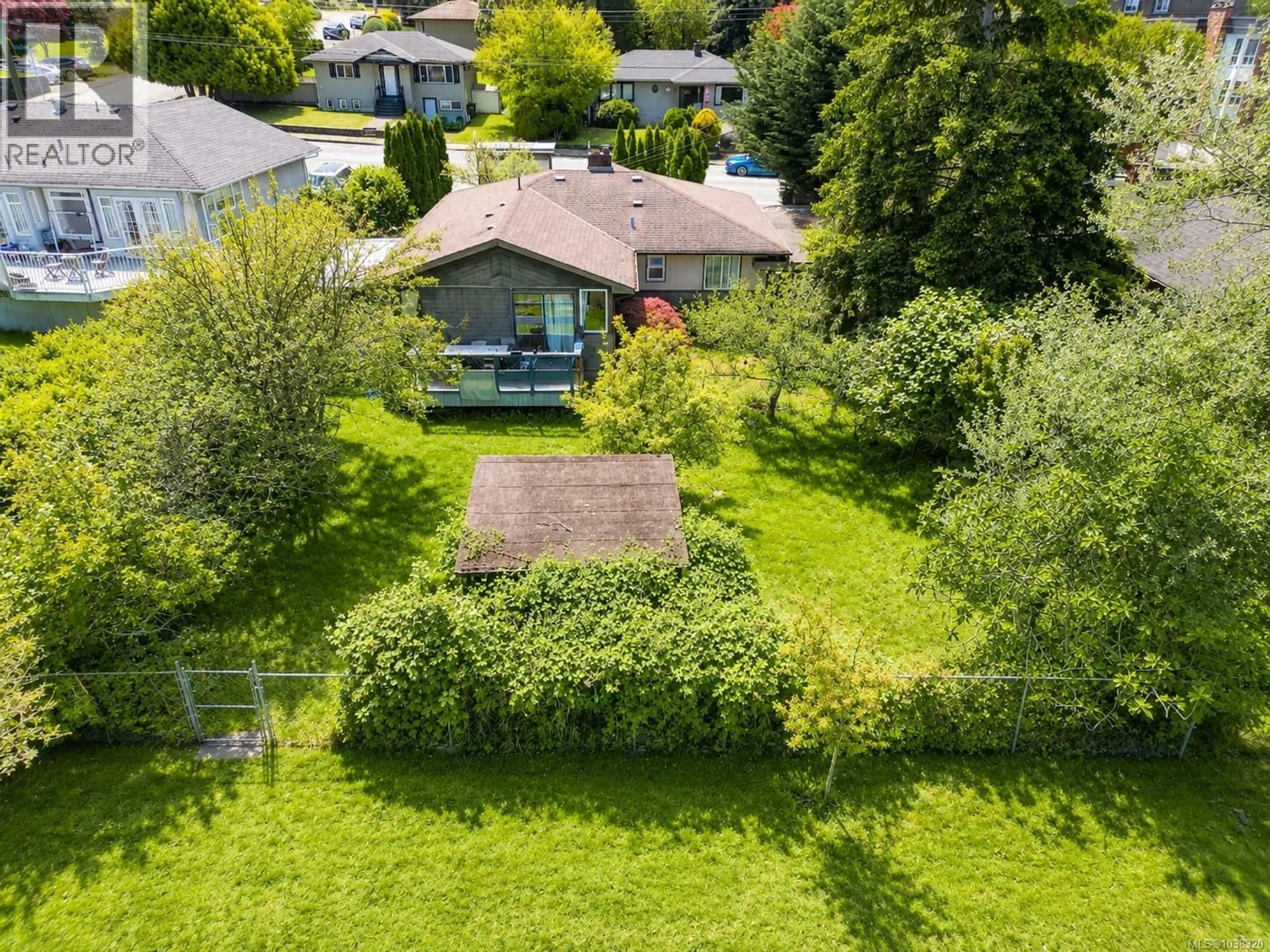 A pic from outside/outdoor area/front of a property/back of a property/a pic from drone, street for 1736 CEDAR HILL CROSS ROAD, Saanich British Columbia V8P2R1