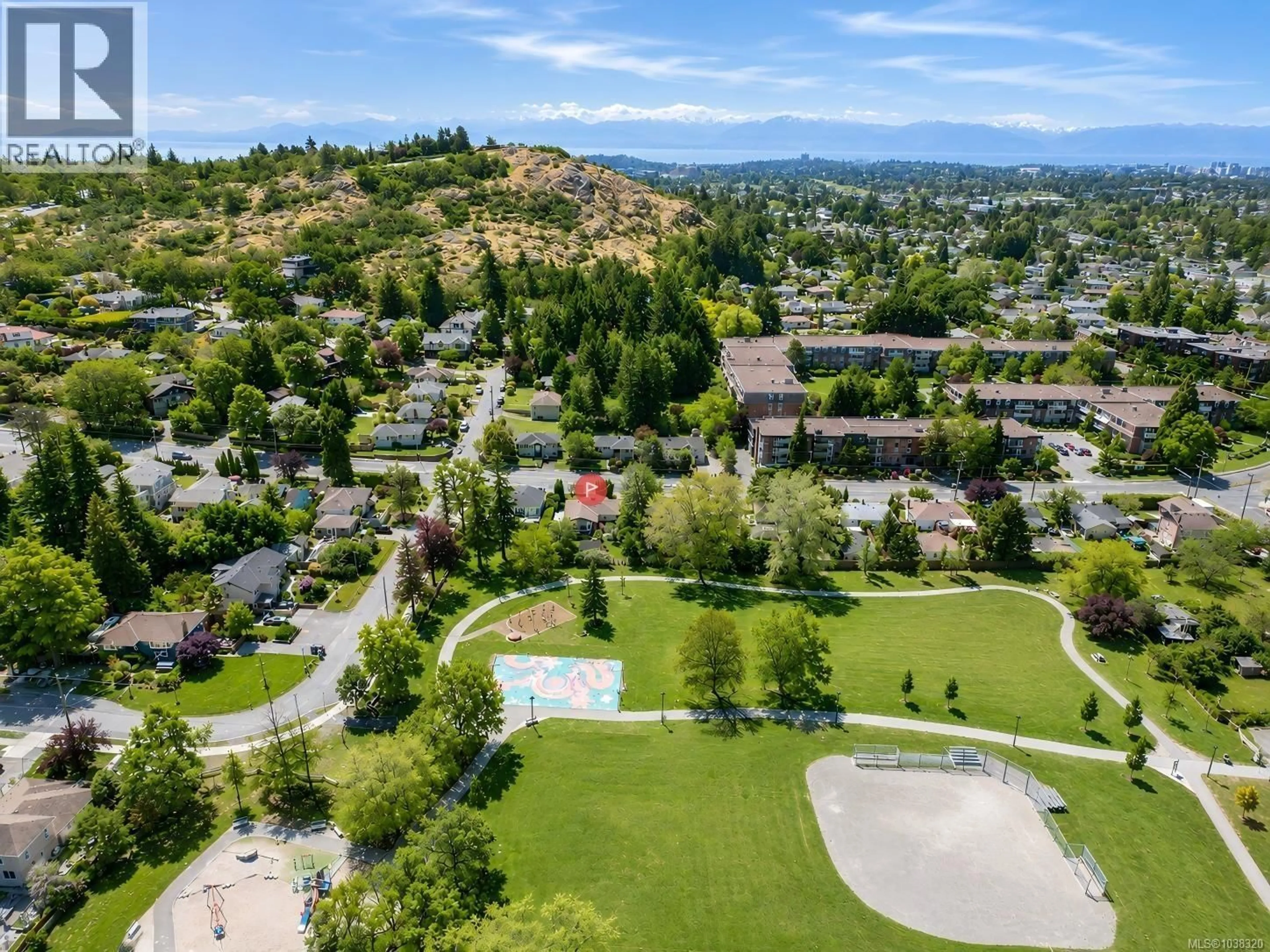 A pic from outside/outdoor area/front of a property/back of a property/a pic from drone, mountain view for 1736 CEDAR HILL CROSS ROAD, Saanich British Columbia V8P2R1