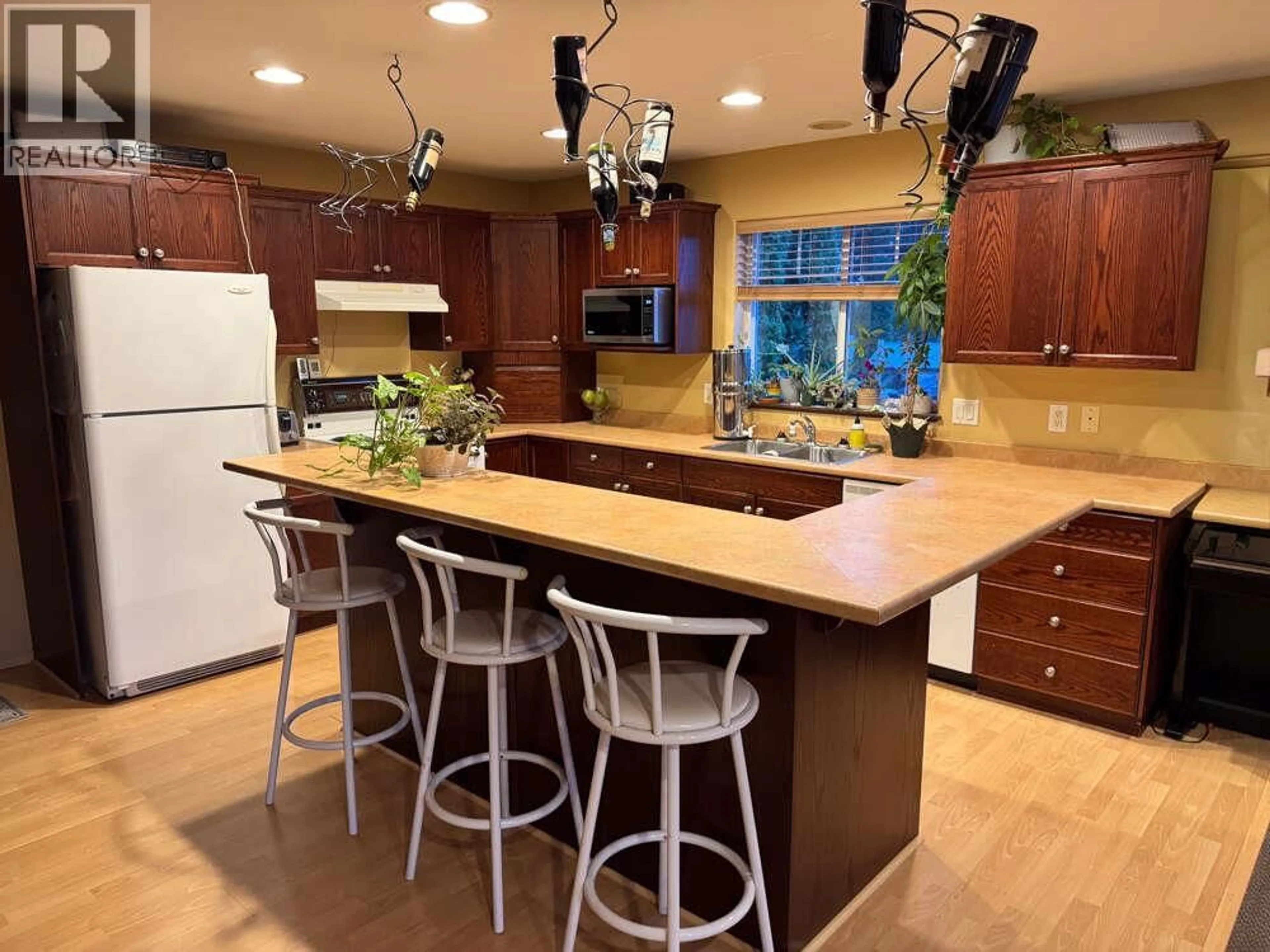 Open concept kitchen, unknown for 2145 CHILCOTIN CRESCENT, Kelowna British Columbia V1V2N9