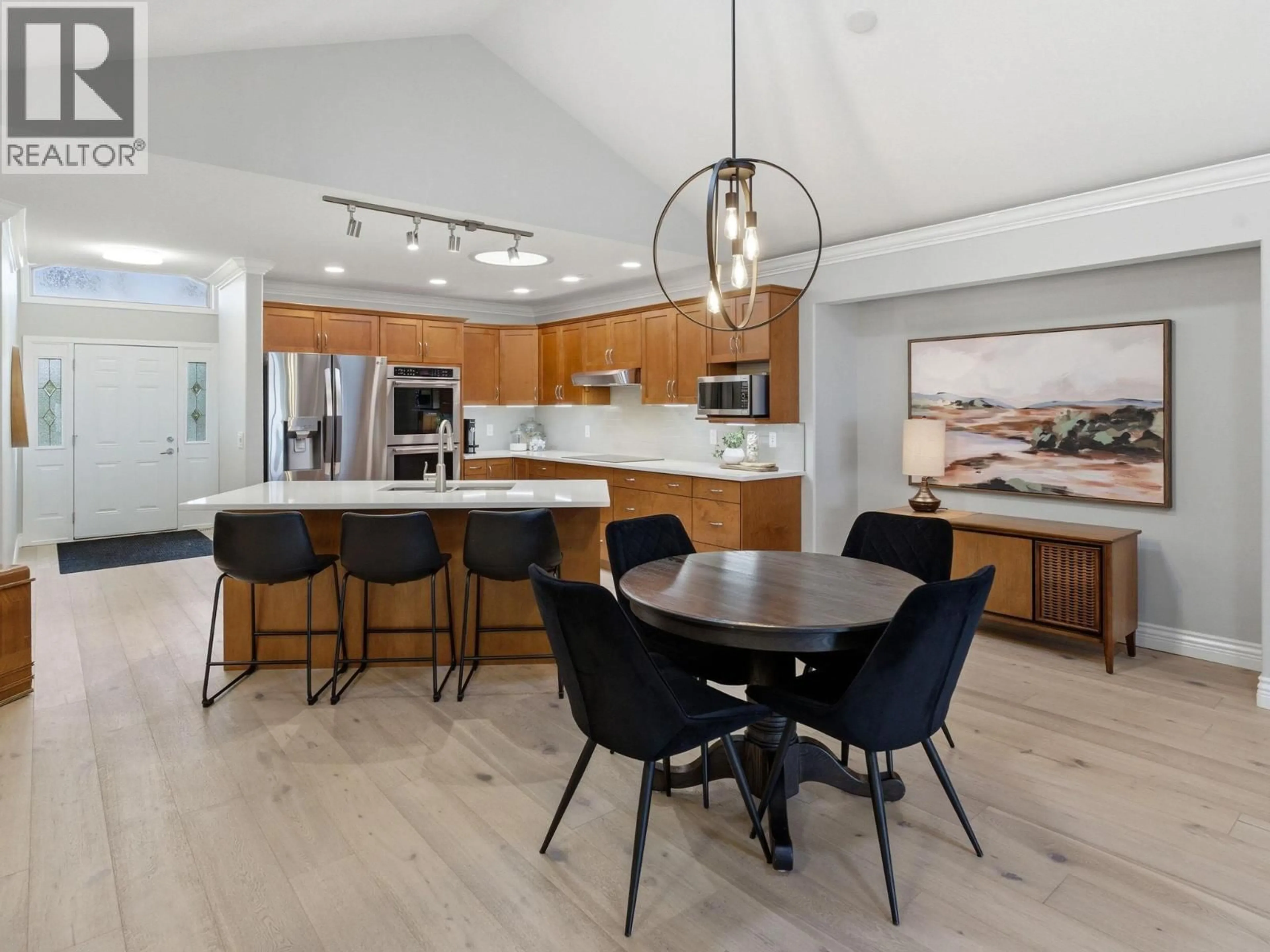 Open concept kitchen, wood/laminate floor for 8 - 2100 BOUCHERIE ROAD, West Kelowna British Columbia V4T2X1