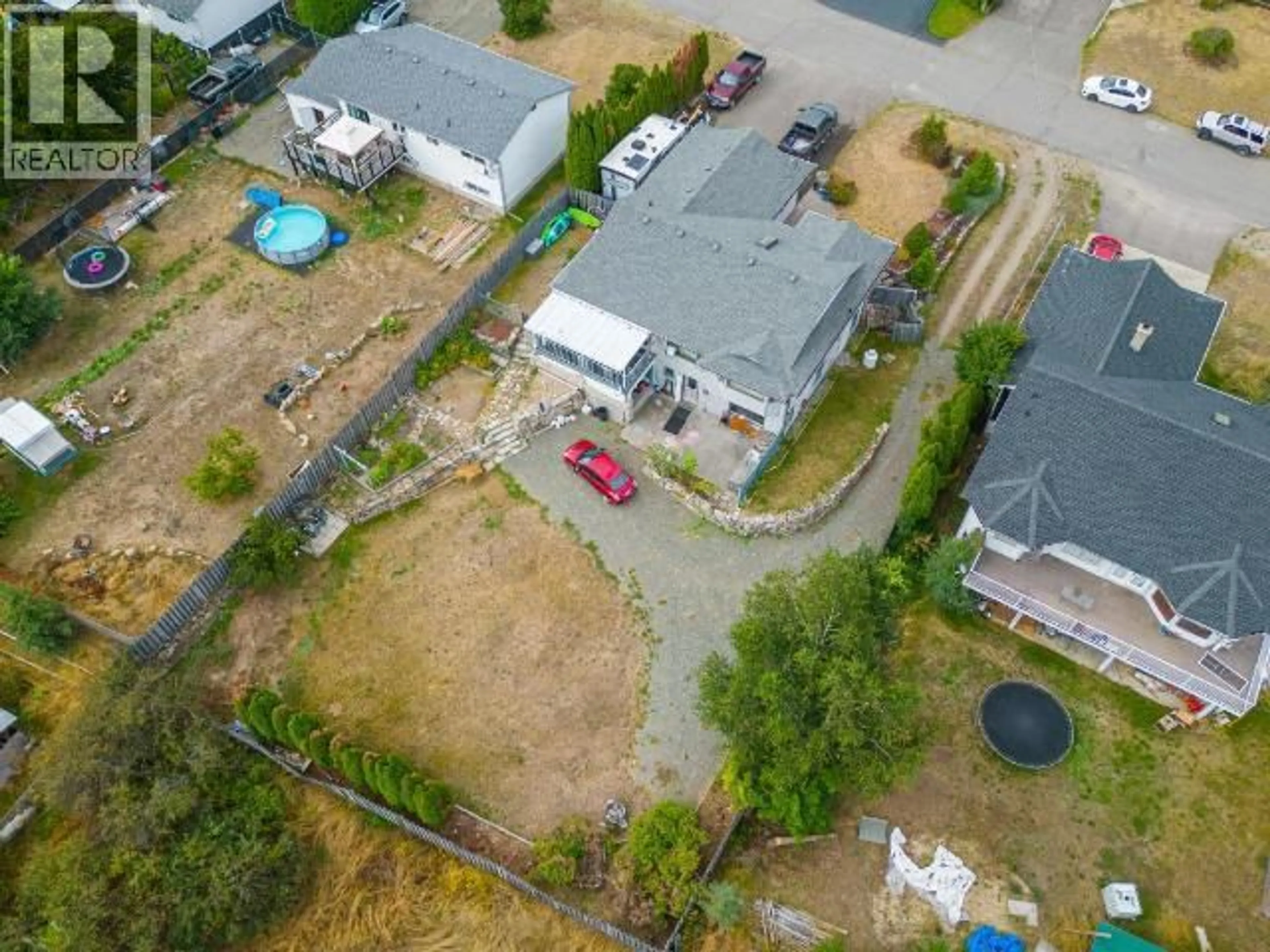 A pic from outside/outdoor area/front of a property/back of a property/a pic from drone, street for 4728 SPRUCE CRESCENT, Barriere British Columbia V0E1E0