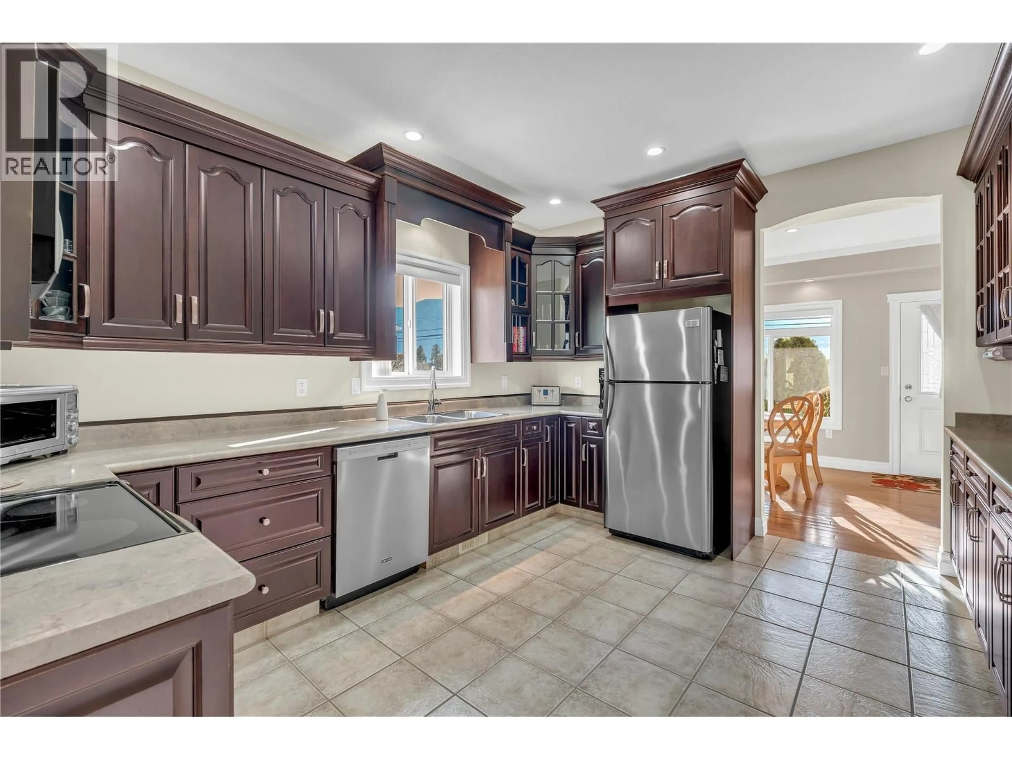 Open concept kitchen, ceramic/tile floor for 103 - 3332 SOUTH MAIN STREET, Penticton British Columbia V2A5J6