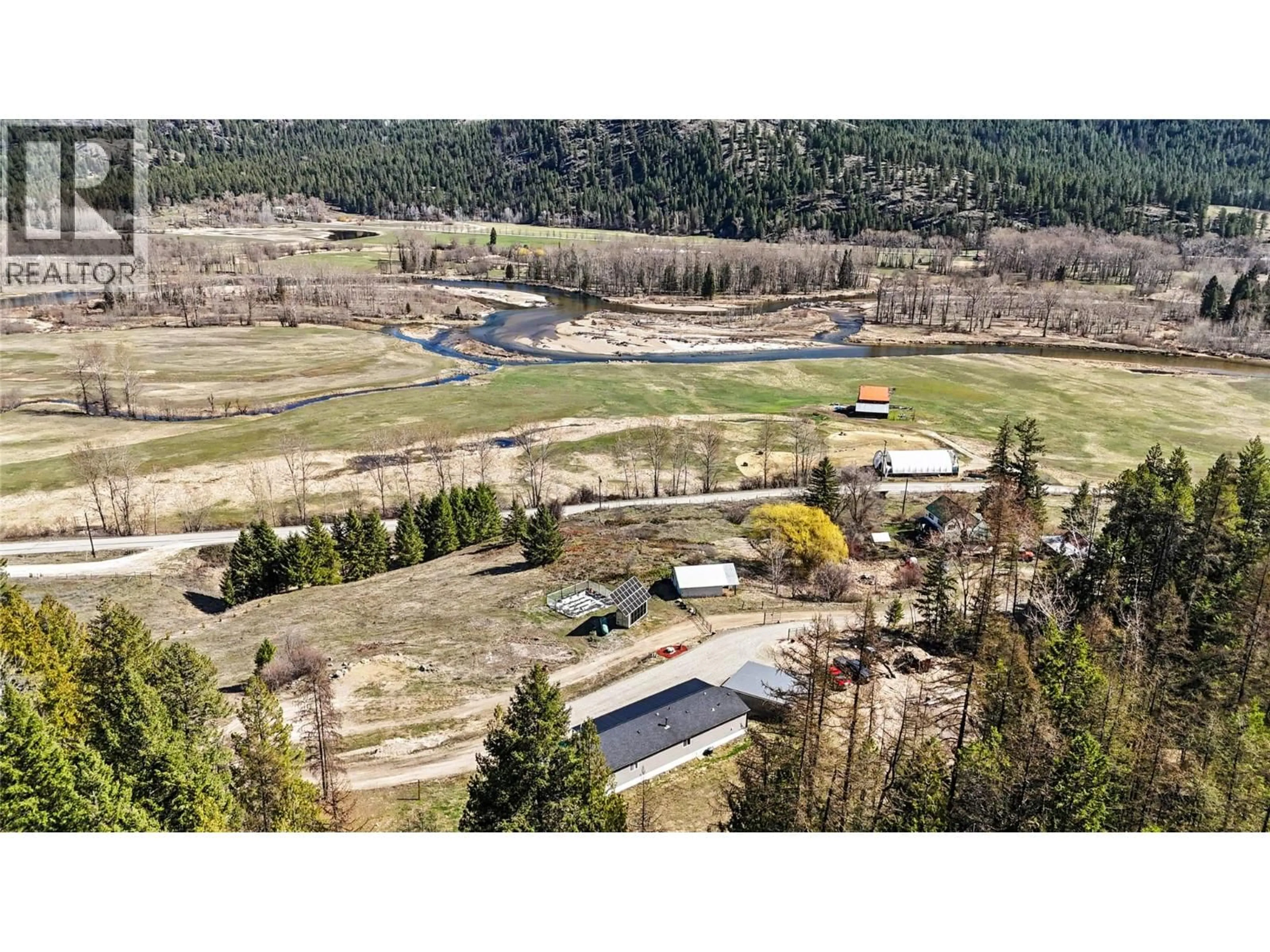 A pic from outside/outdoor area/front of a property/back of a property/a pic from drone, unknown for 10899 SEABROOK ROAD, Grand Forks British Columbia V0H1H8