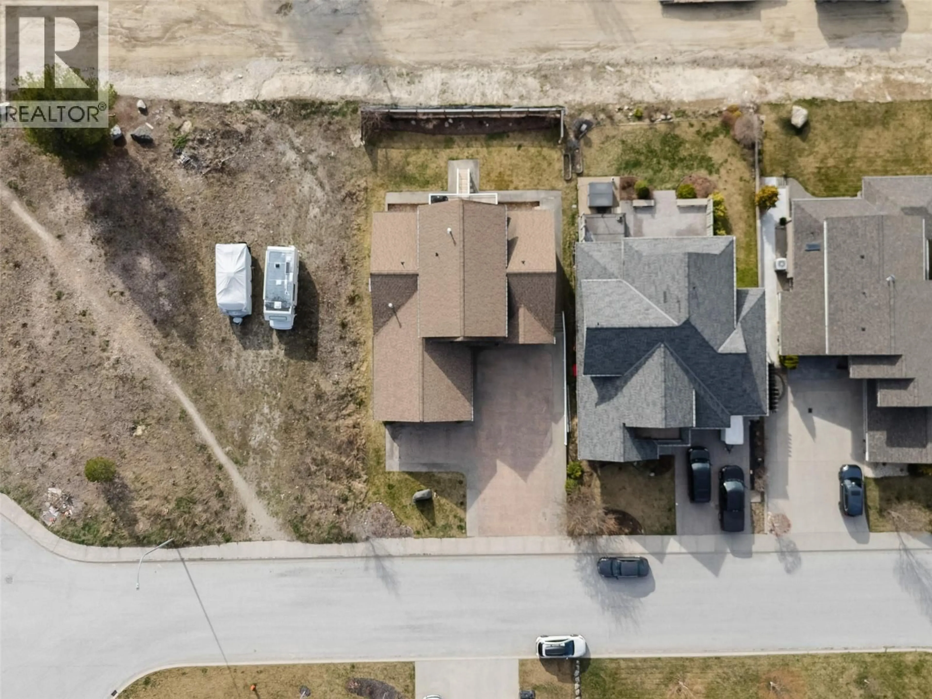 A pic from outside/outdoor area/front of a property/back of a property/a pic from drone, street for 449 HAMPTON GRAY PLACE, Nelson British Columbia V1L7A8