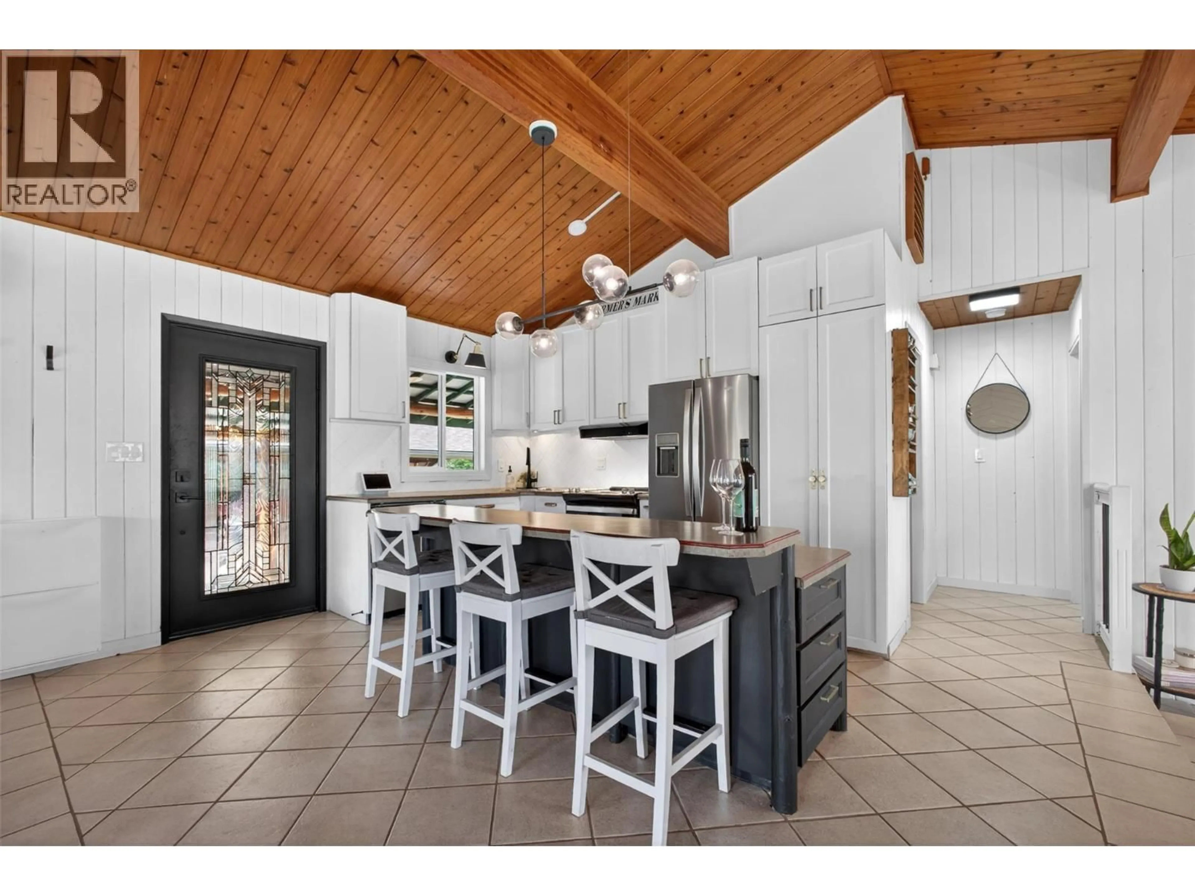 Open concept kitchen, ceramic/tile floor for 374 KILDARE WAY, Vernon British Columbia V1H2C7
