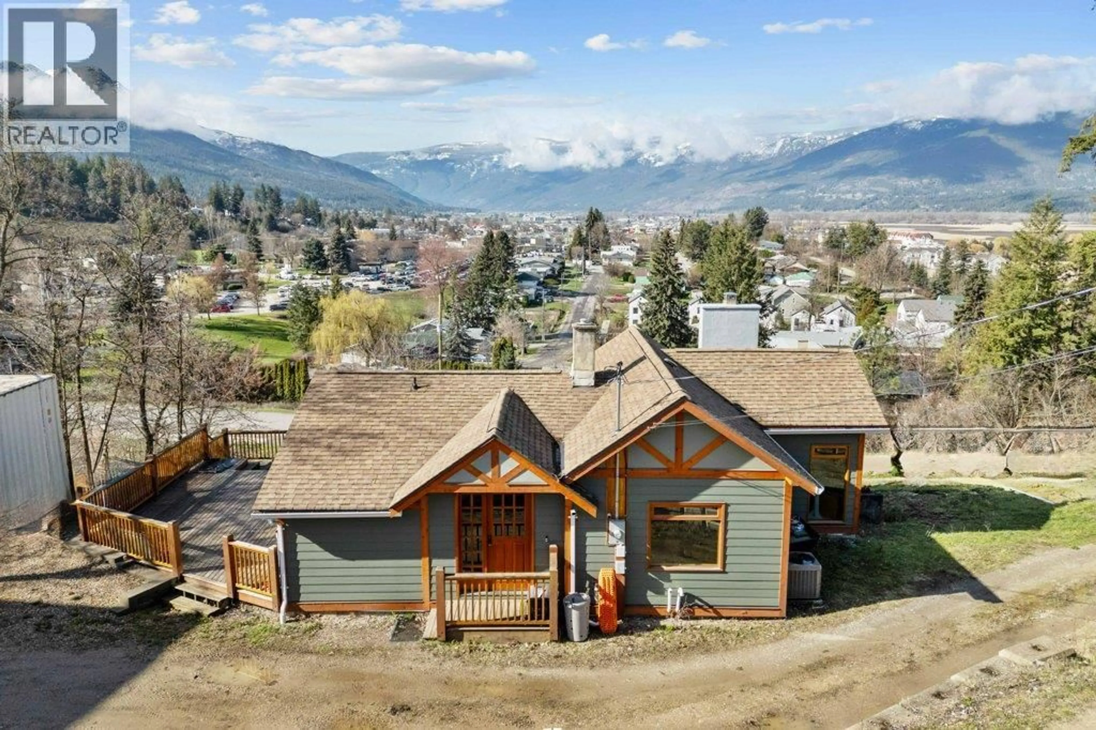 A pic from outside/outdoor area/front of a property/back of a property/a pic from drone, mountain view for 1321 10 AVENUE NORTHEAST, Salmon Arm British Columbia V1E2V6