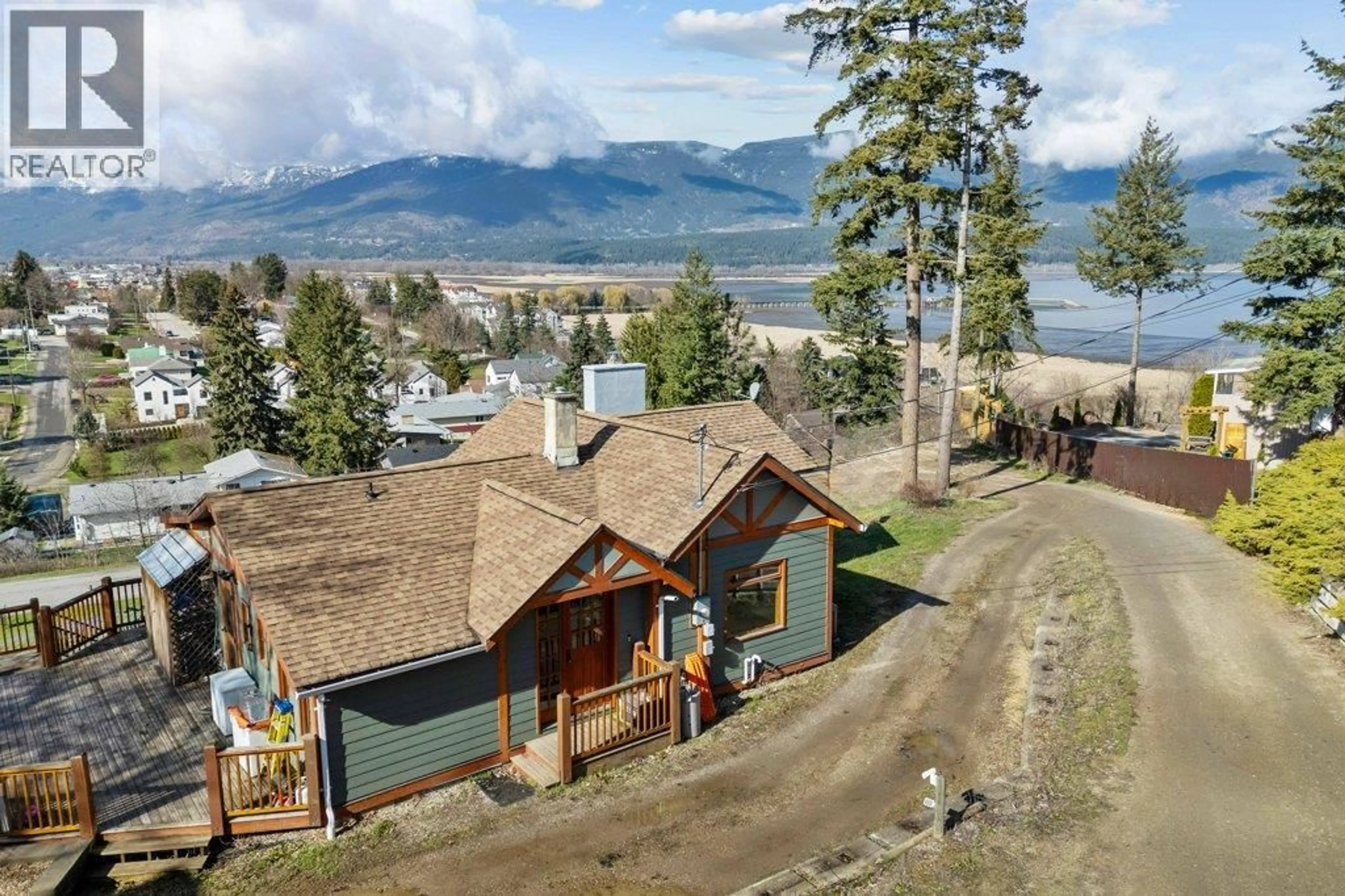 A pic from outside/outdoor area/front of a property/back of a property/a pic from drone, mountain view for 1321 10 AVENUE NORTHEAST, Salmon Arm British Columbia V1E2V6