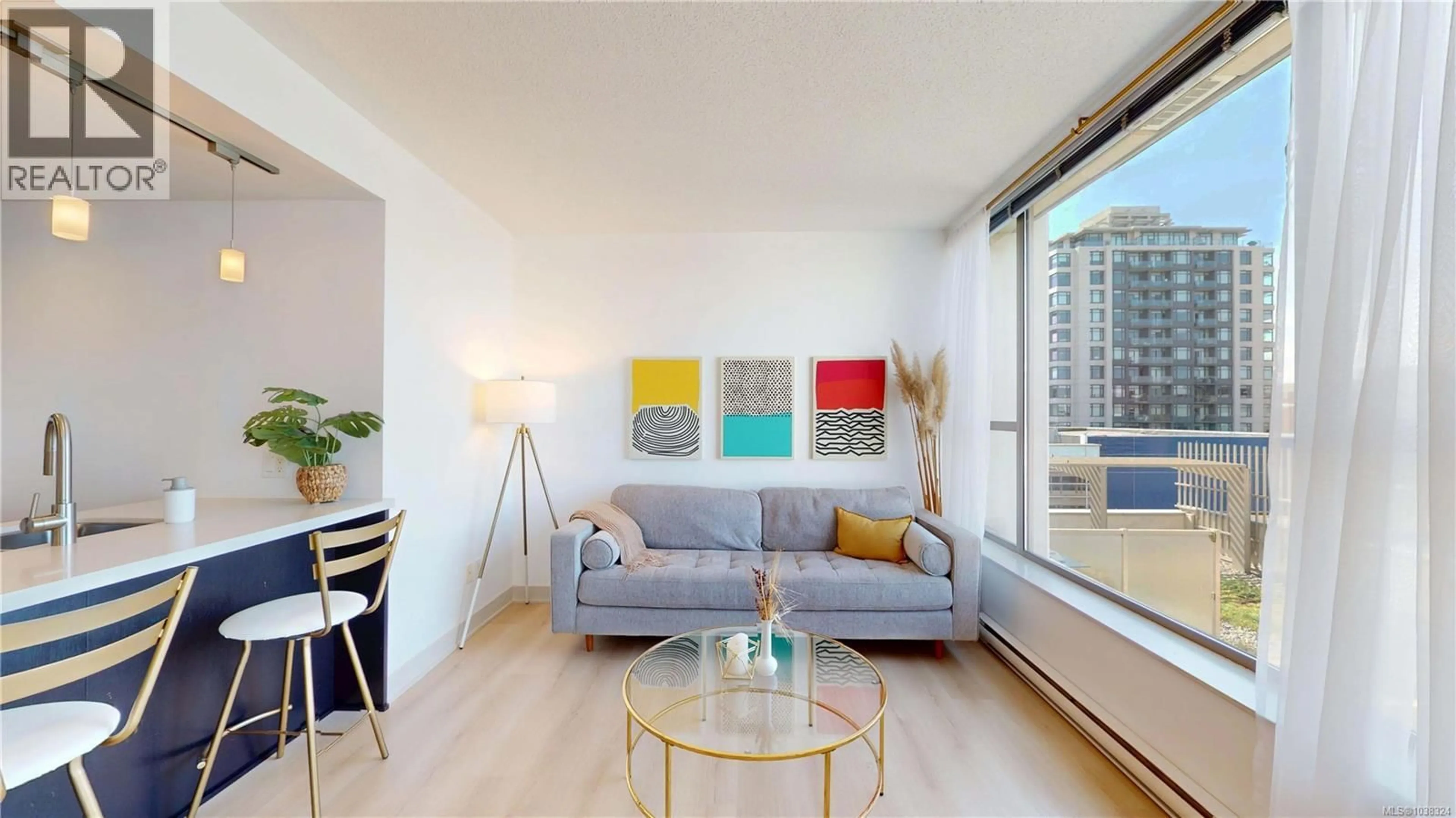 Living room with furniture, wood/laminate floor for 603 - 760 JOHNSON STREET, Victoria British Columbia V8W1N1
